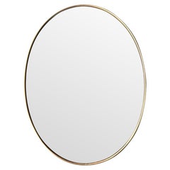 Grand miroir italien original des années 1960 avec cadre ovale en laiton