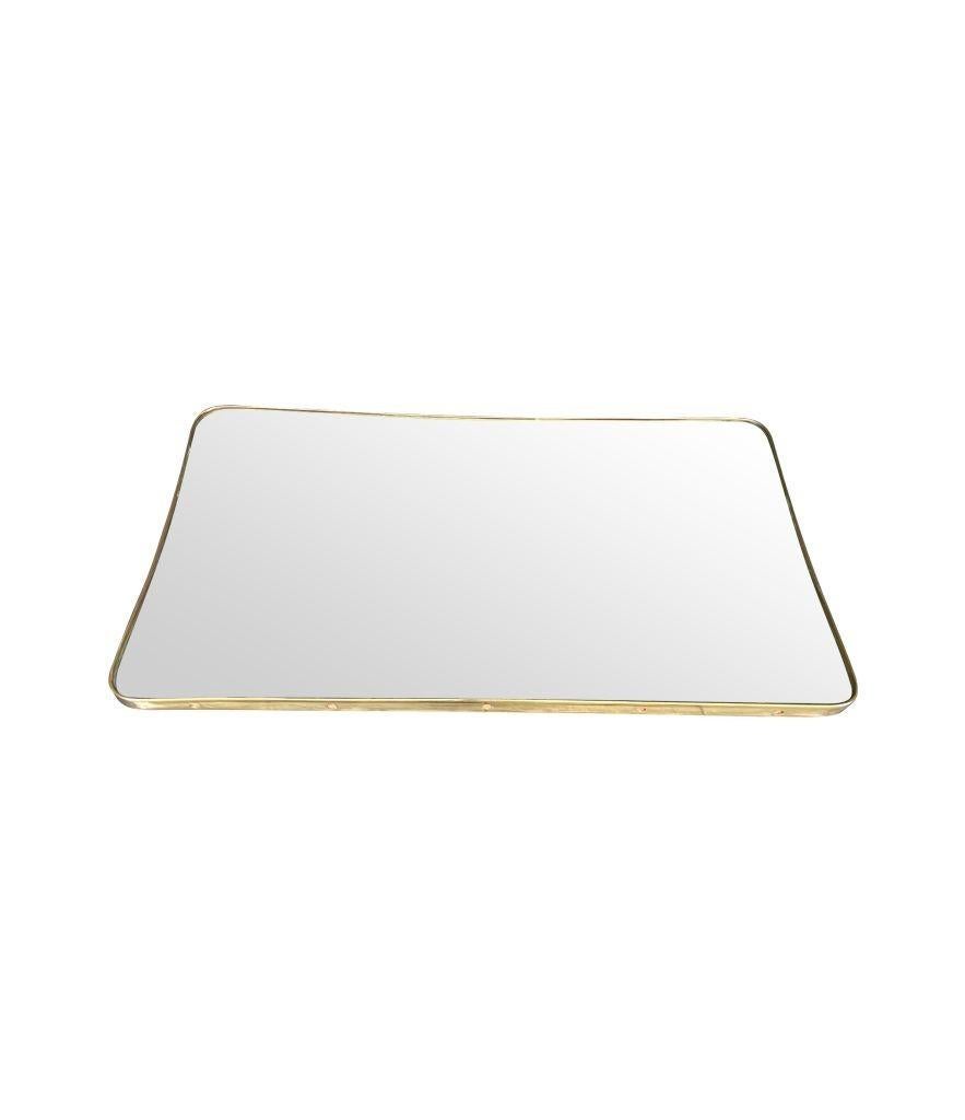Mid-20th Century A large orignal Italian landscape 1950s brass framed mirror with orignal plate