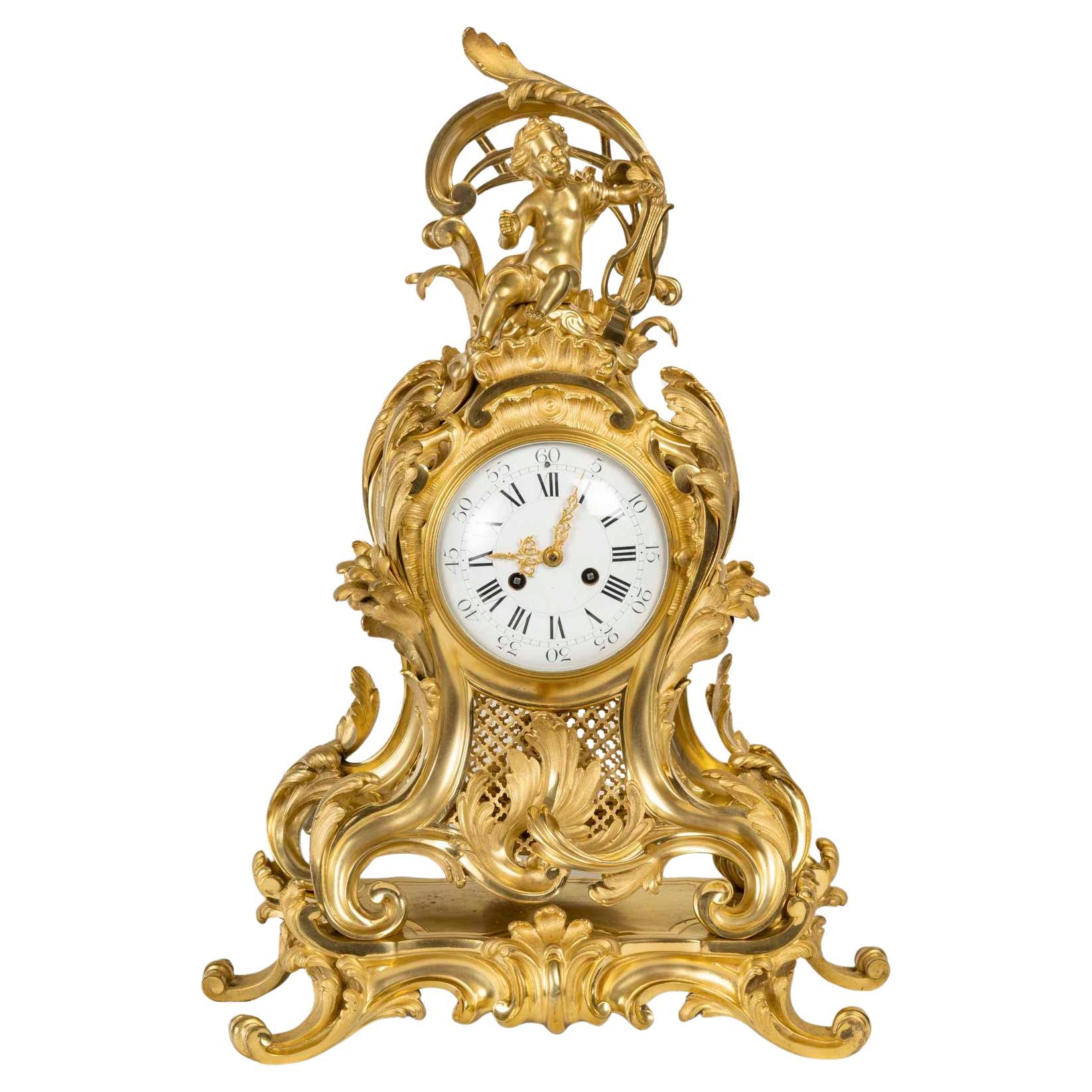 A Large Ormolu and Chased Cartel Clock in the Louis XV Style, 19th Century. For Sale
