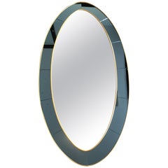 Large Oval Mirror in the Manner of Cristal Arte with Blue Mirror Surround