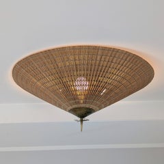 Una grande lampada da incasso Paavo Tynell modello 1076 in ottone e rattan, Idman anni '50