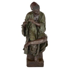 Vintage Large Painted Terracotta Figure of a Boy Playing the Flute by Goldscheider