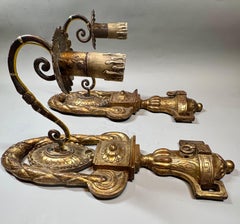 A large Pair antique of Louis XVI style gilt stucco wall lights/ appliques