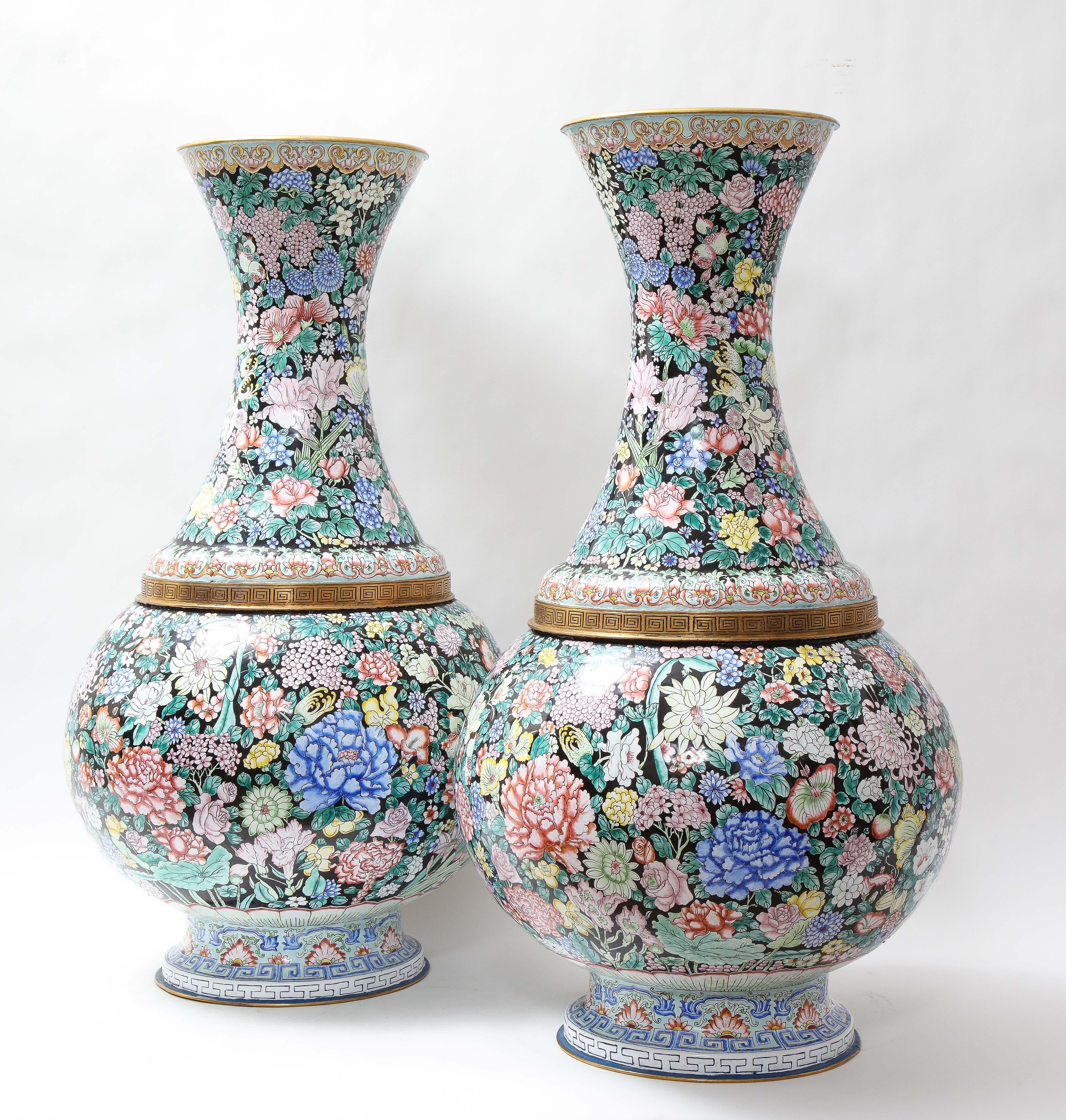 Early 20th Century Large Pair Chinese Famille Noir Canton Enamel Vases Painted W/ Flowers & Fruit For Sale