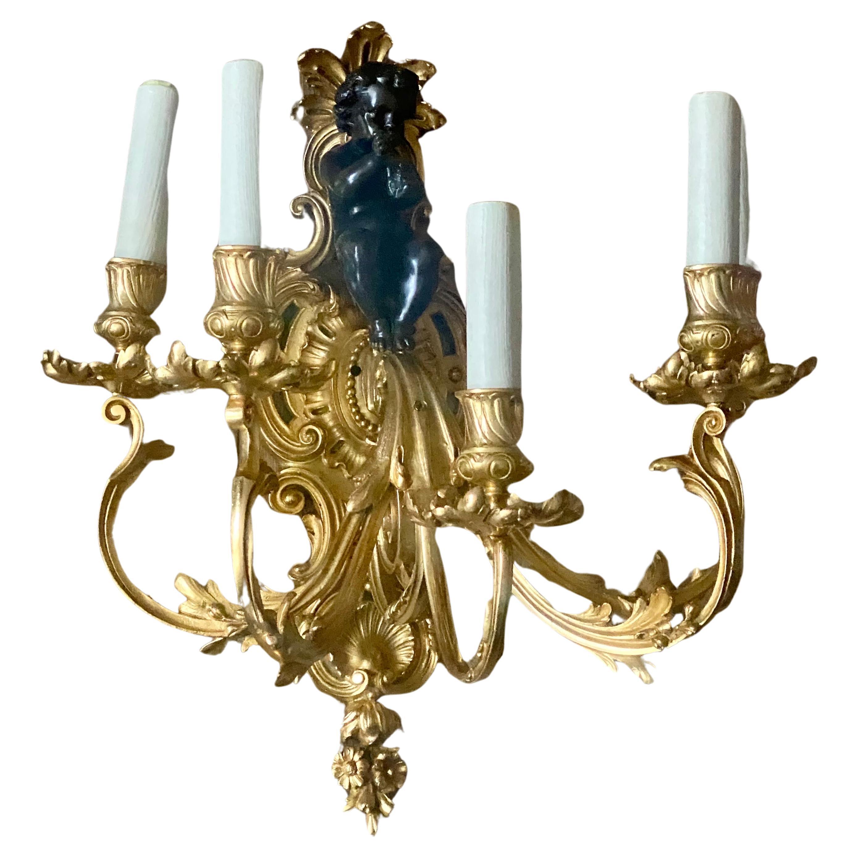 Late 19th Century A Large Pair of 19th Century French Gilt Bronze Dore Cherub Wall Sconces For Sale