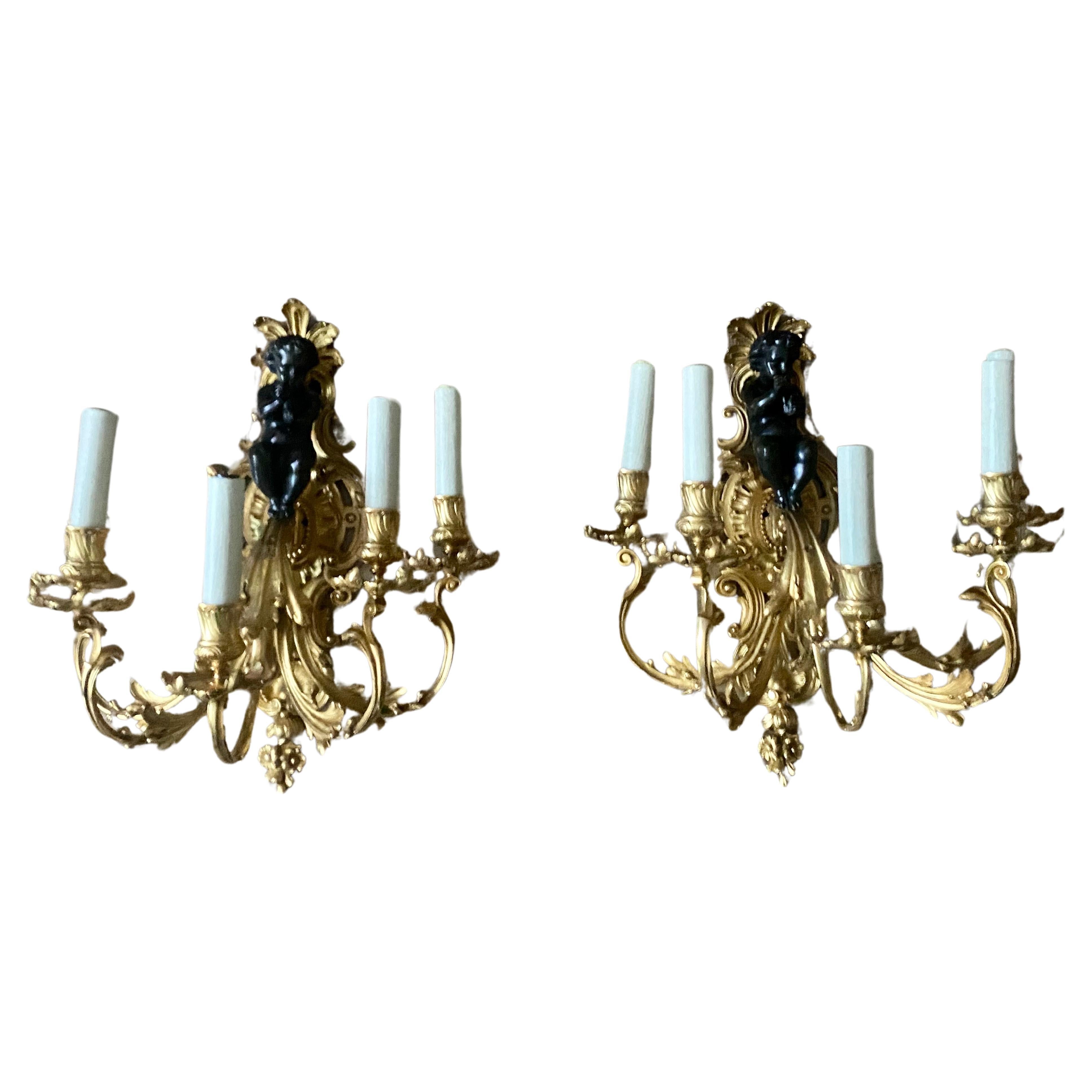 A Large Pair of 19th Century French Gilt Bronze Dore Cherub Wall Sconces