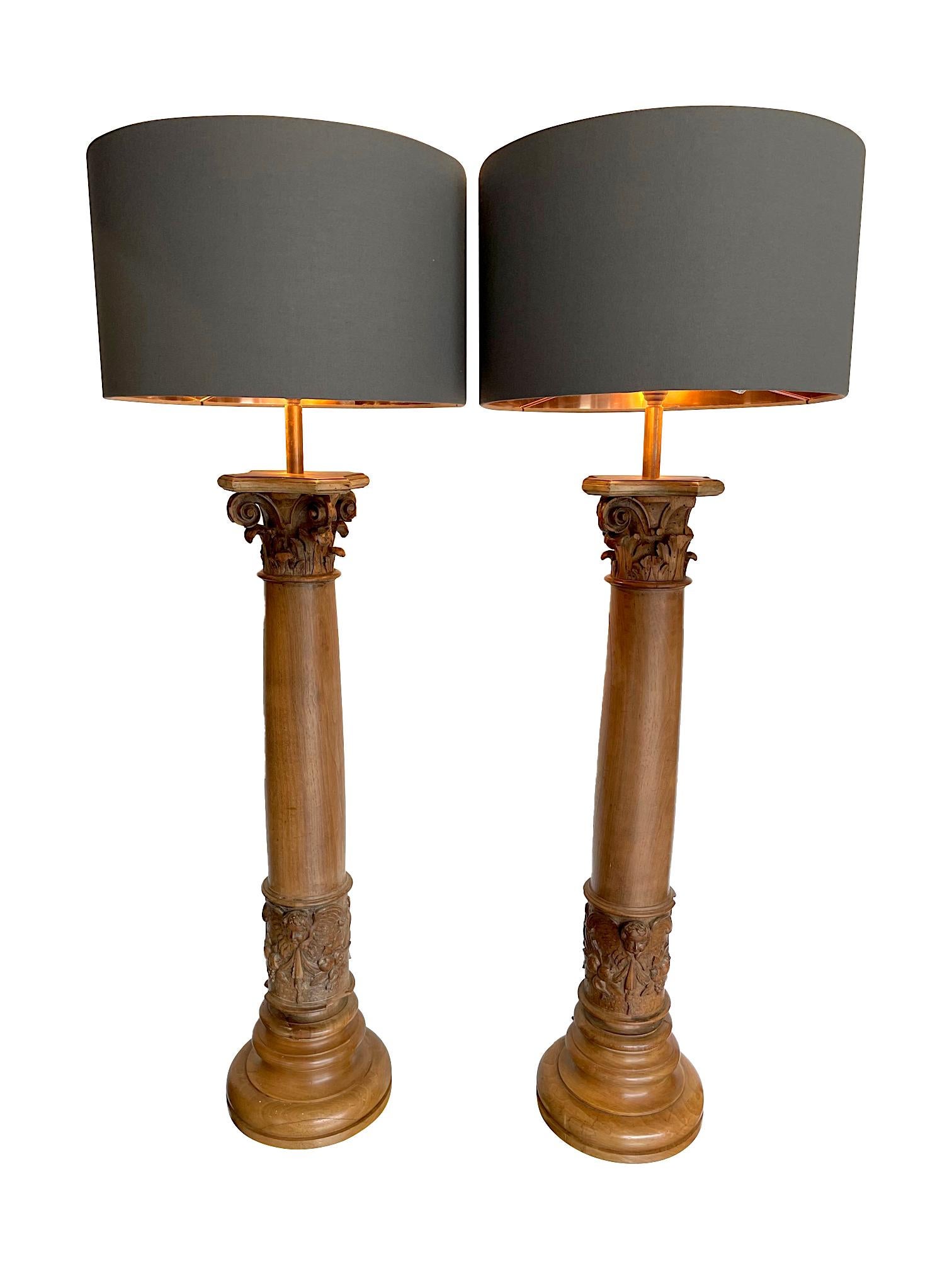 Renaissance Revival Large Pair of 19th Century Oak Corinthian Column Lamps with Carved Cherubs