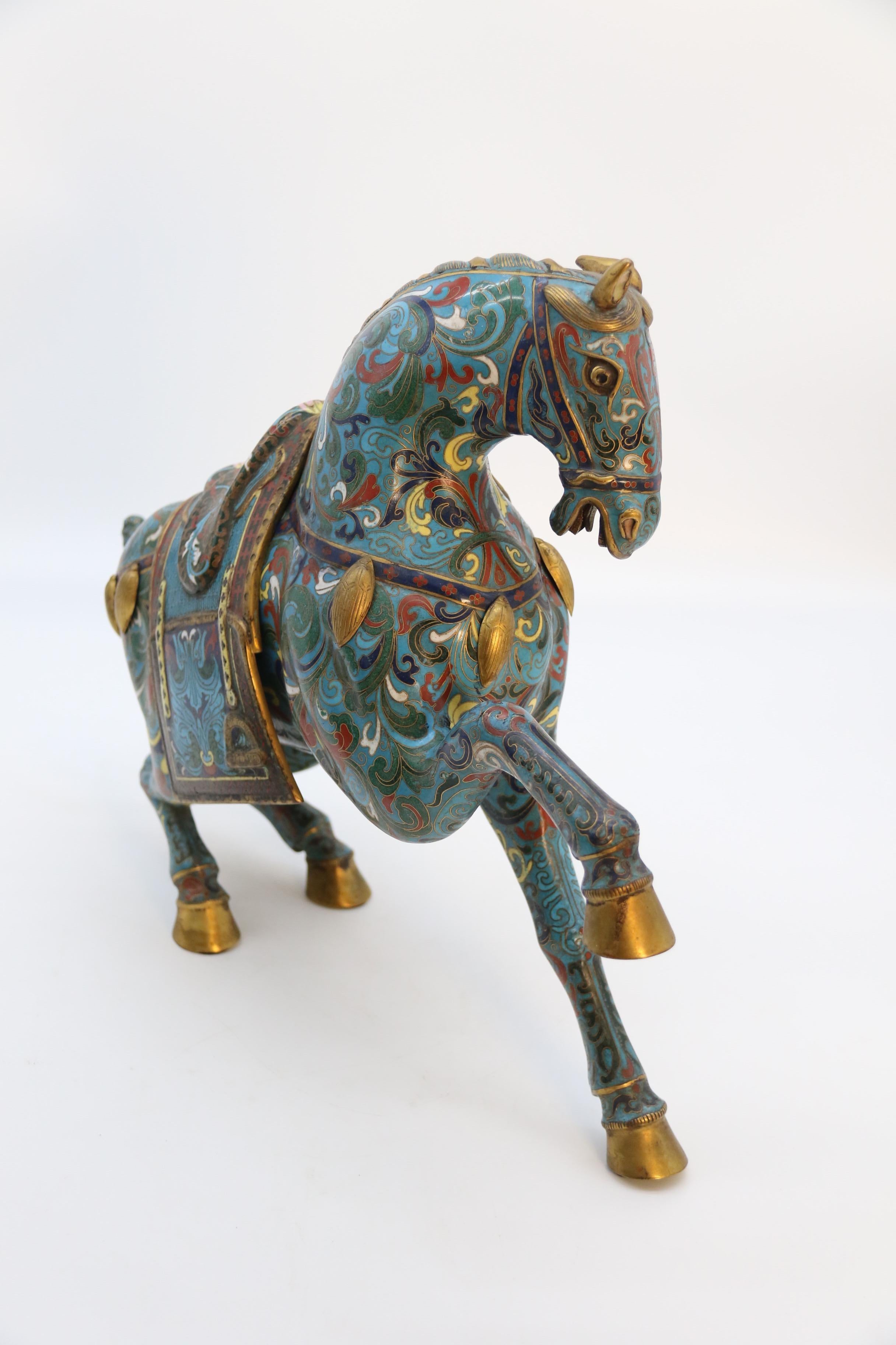 A large pair of antique Chinese archaic style cloisonne horses circa 1910 11