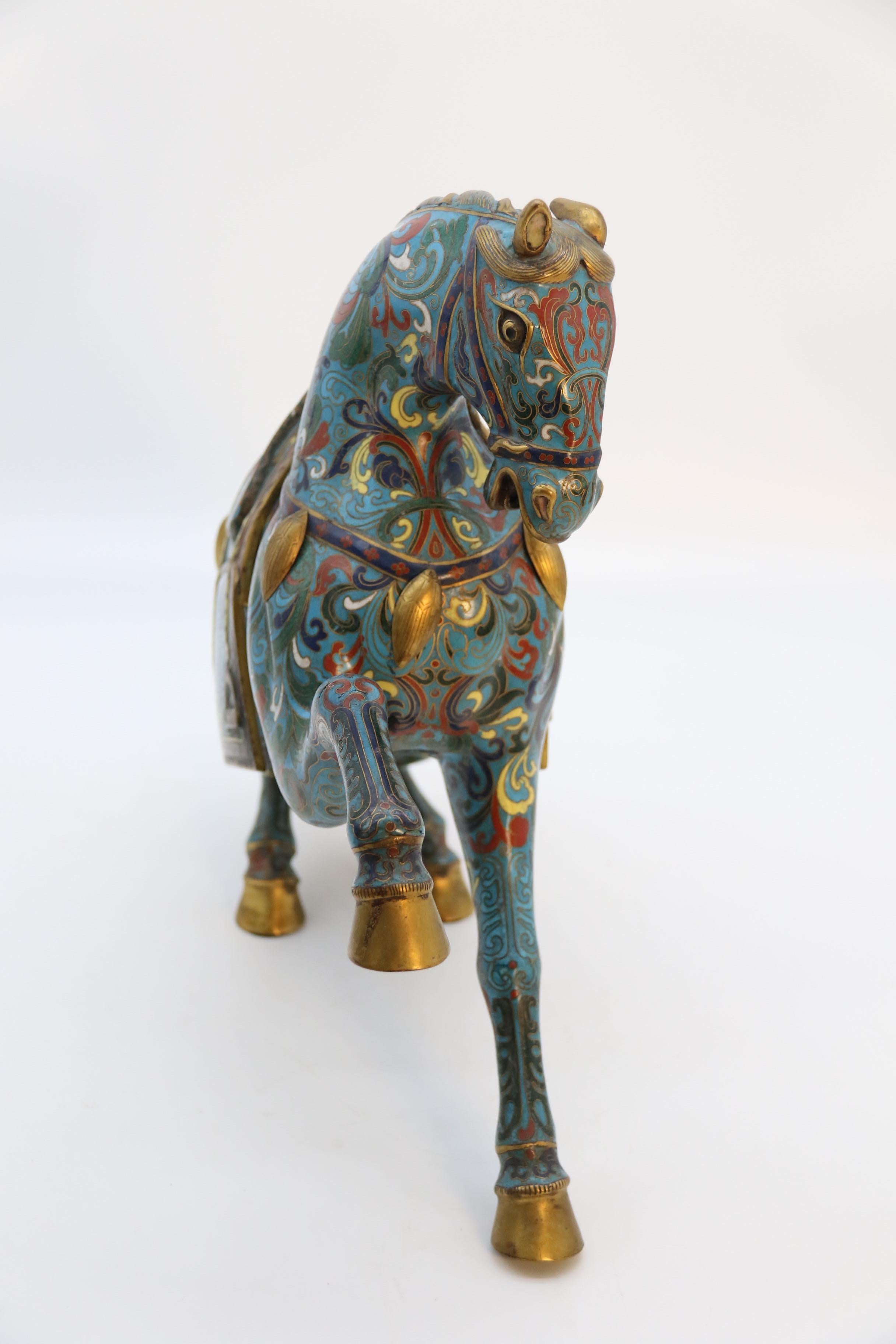 A large pair of antique Chinese archaic style cloisonne horses circa 1910 12