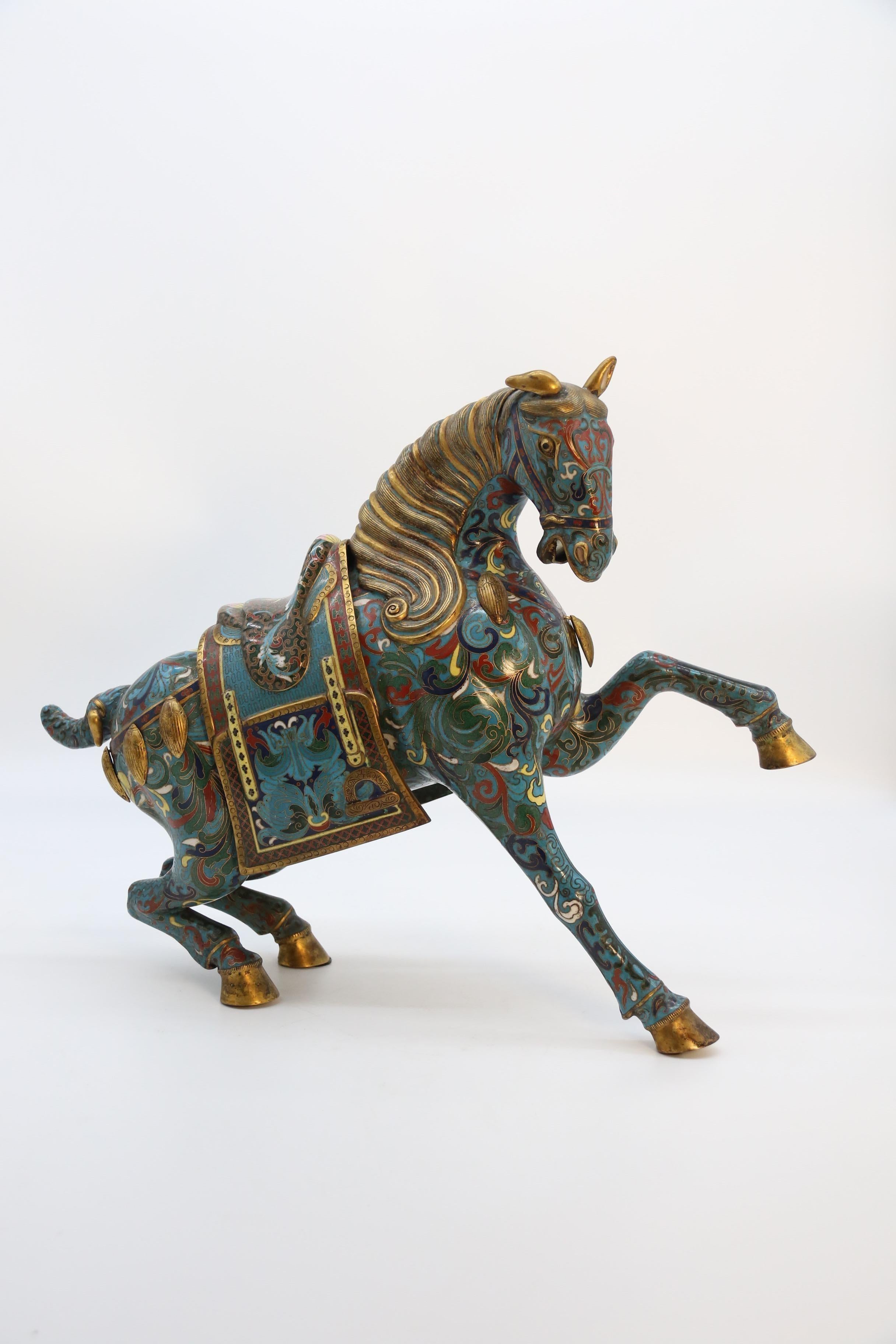 These superb and most impressive decorative high quality Chinese archaic style horses date to the early 20th century. They are an original pair made left and right handed showing prancing horses. They have been very well modelled with good