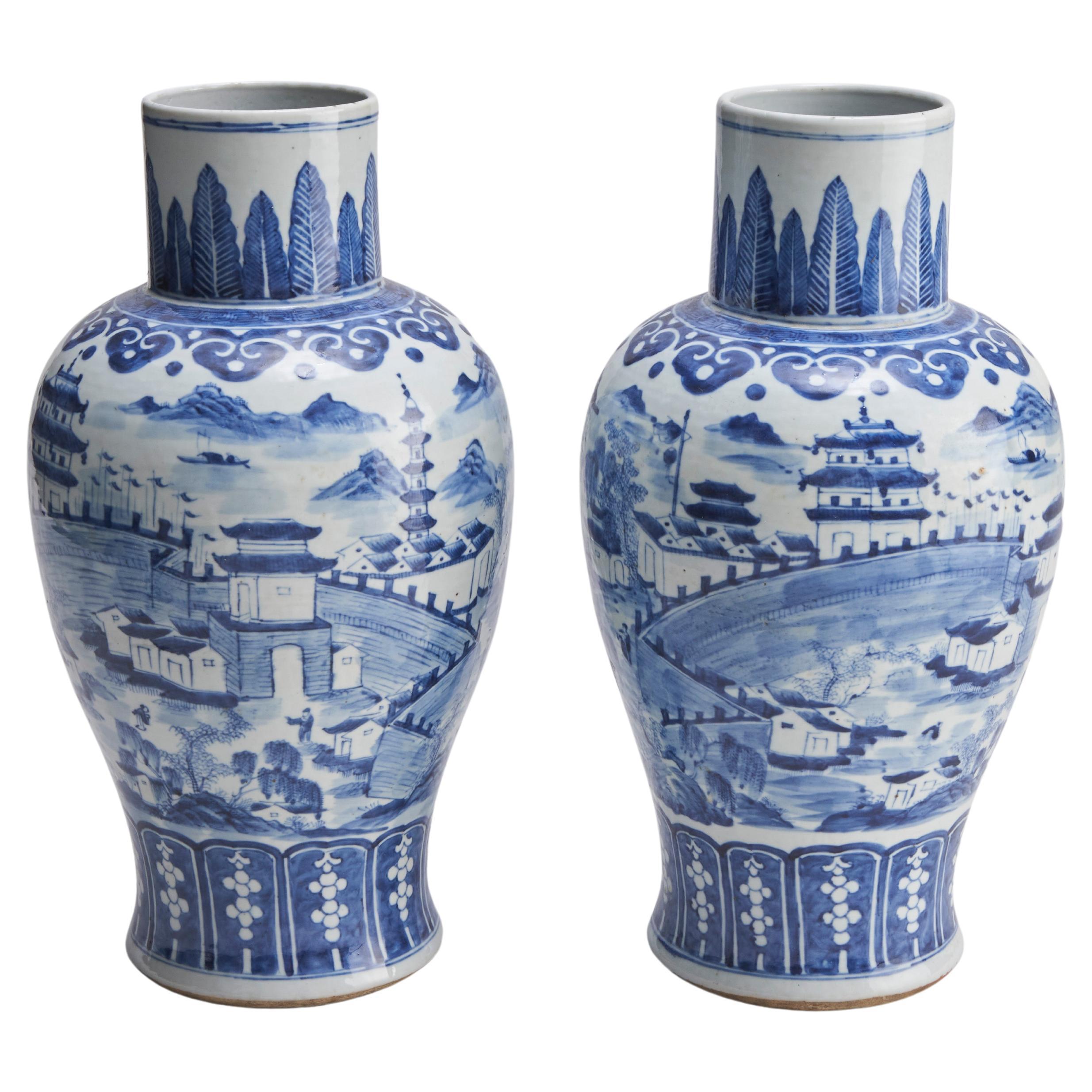 A large pair of antique Chinese blue and white porcelain vases  For Sale