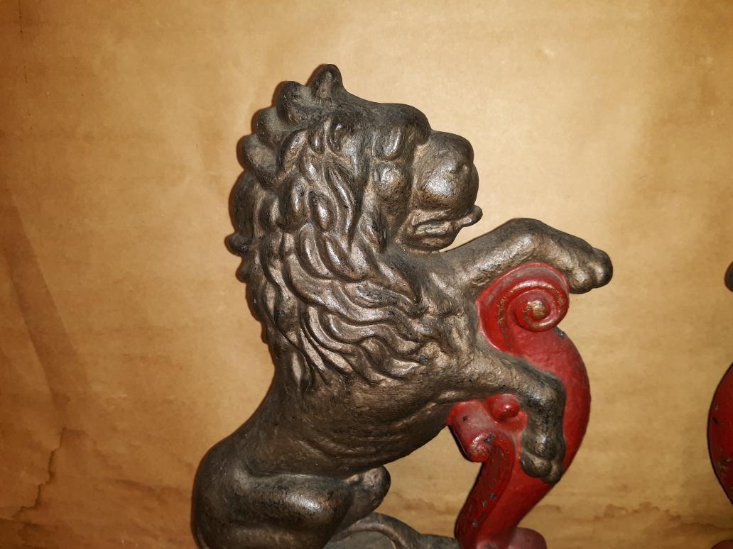 Large Pair of Antique English Cast Iron Passant Lion Door Stops  In Good Condition In Lambertville, NJ
