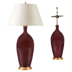 A Large Pair of Aubergine Purple Flambe Lamps, the vases by Rupert Spira