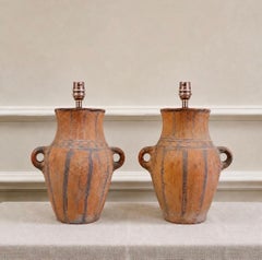 A large pair of Berber terracotta vases now as lamps