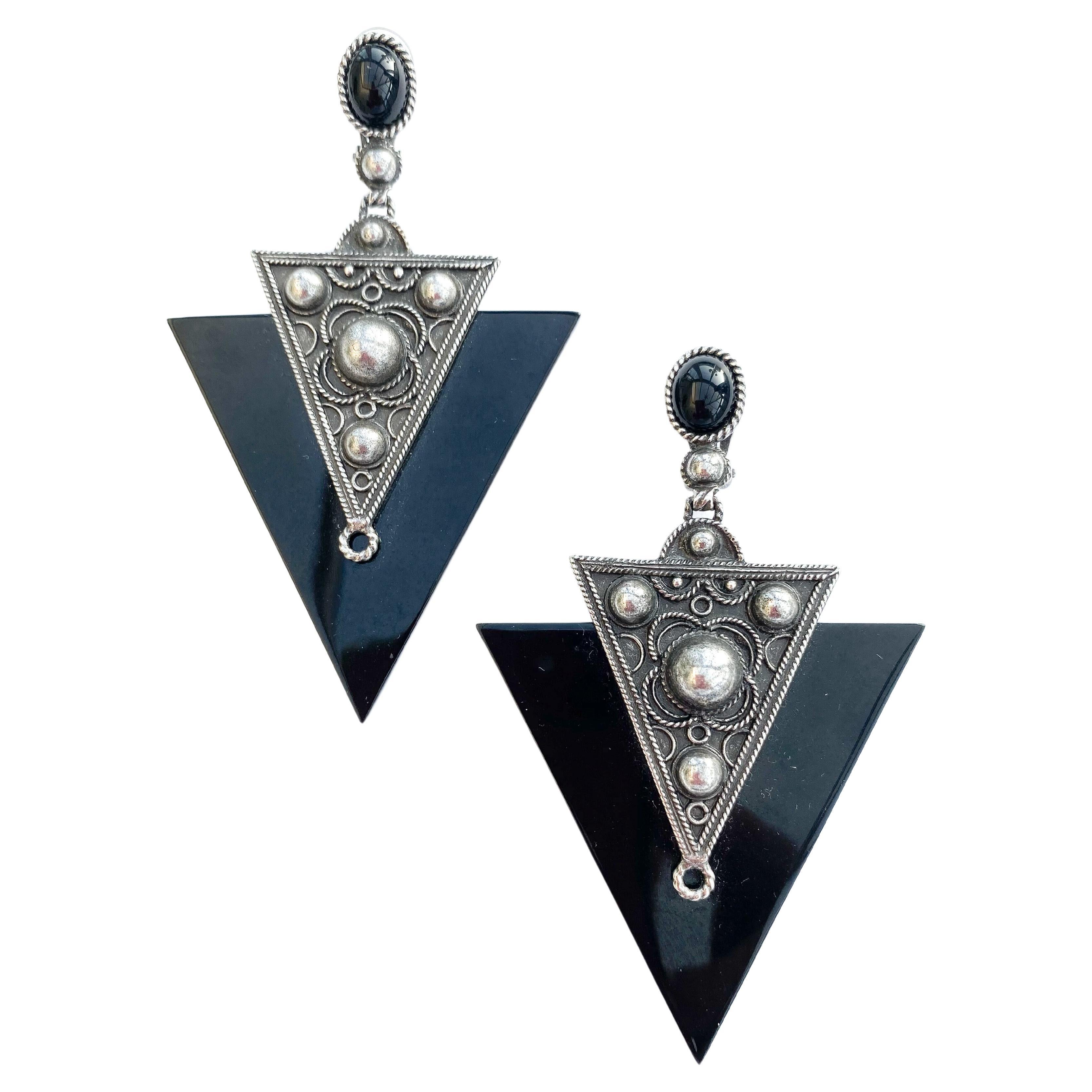 A large pair of black and silvered metal earrings, Yves Saint Laurent, 1990s. For Sale