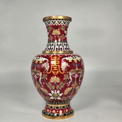 A large pair of boldly decorated Chinese cloisonné vases circa 1930