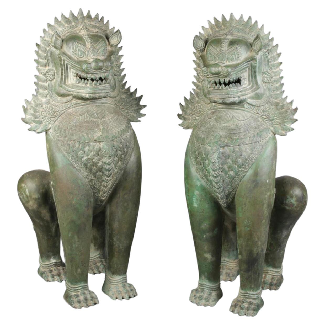 Large Pair of Bronze Khmer Sculptures Modelled as Temple Lions For Sale
