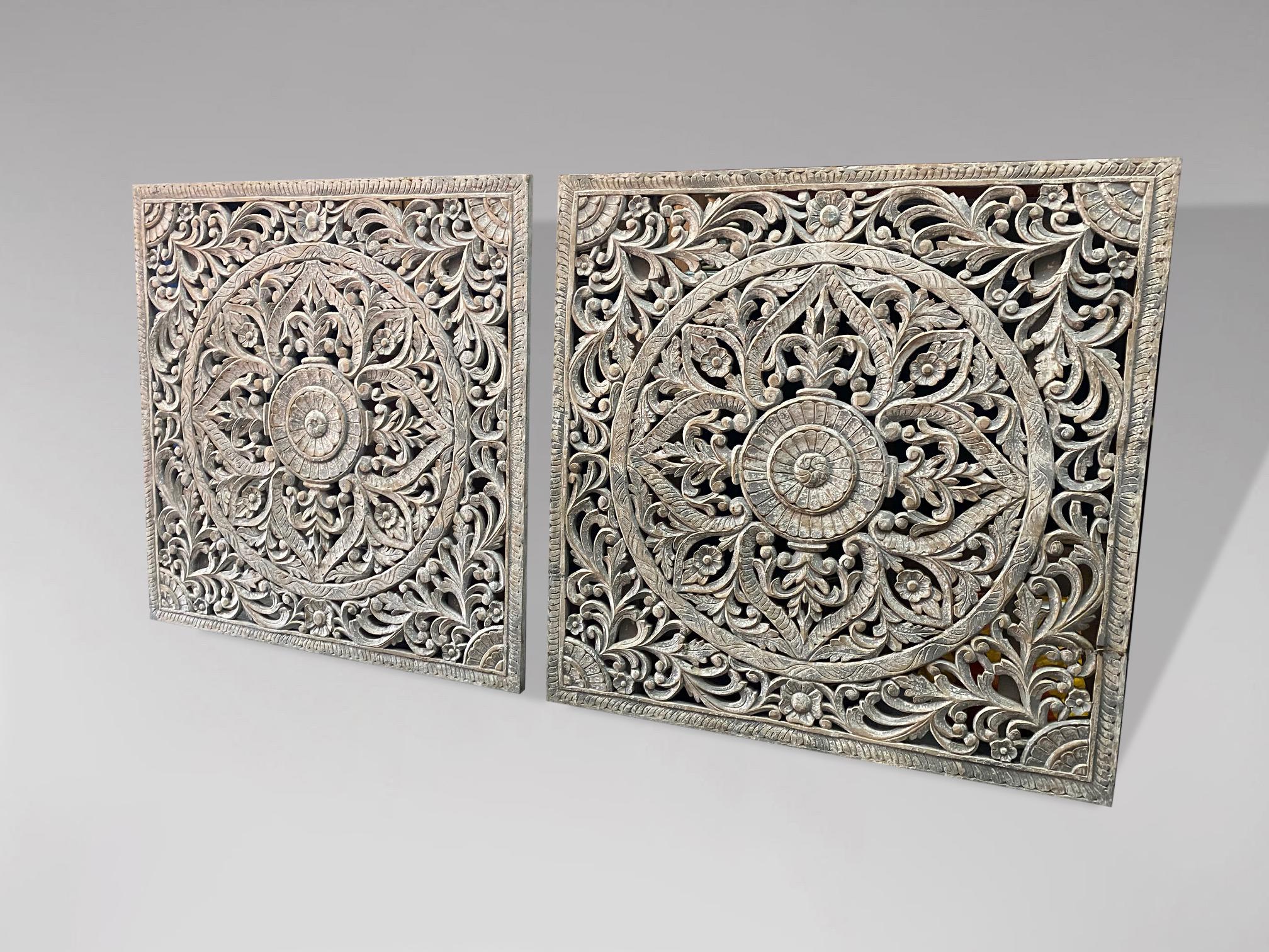 A pair of antique very decorative carved painted wooden panels from India. Could be used as very decorative headboards for a bed. Gorgeous pair of carved and painted panels with a lot of character, with good proportions, very good height,