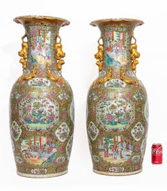 A Large Pair of Chinese Famille Rose Decorated Gilt Foo Dog Handle Vases