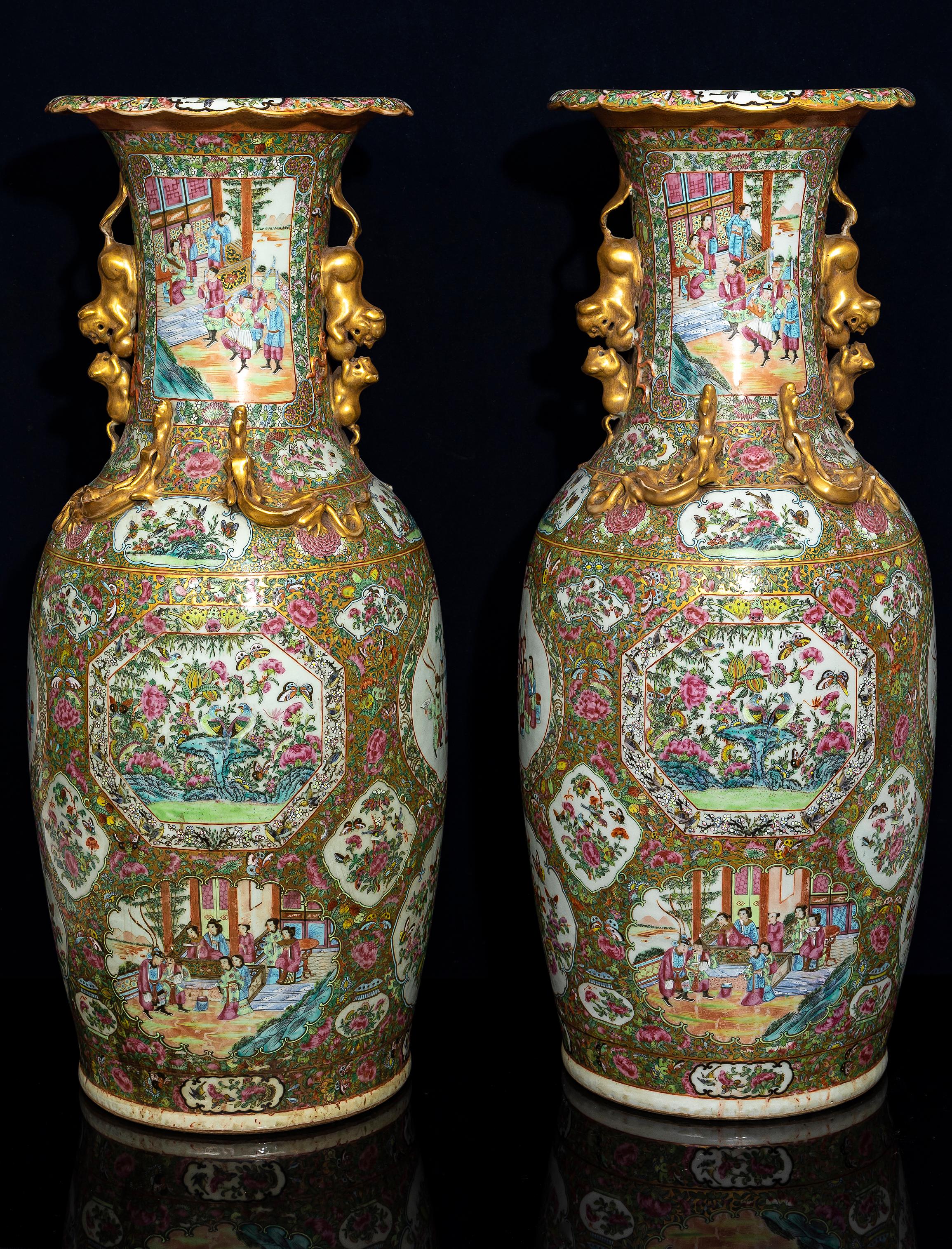 Hand-Carved A Large Pair of Chinese Famille Rose Decorated Gilt Foo Dog Handle Vases For Sale