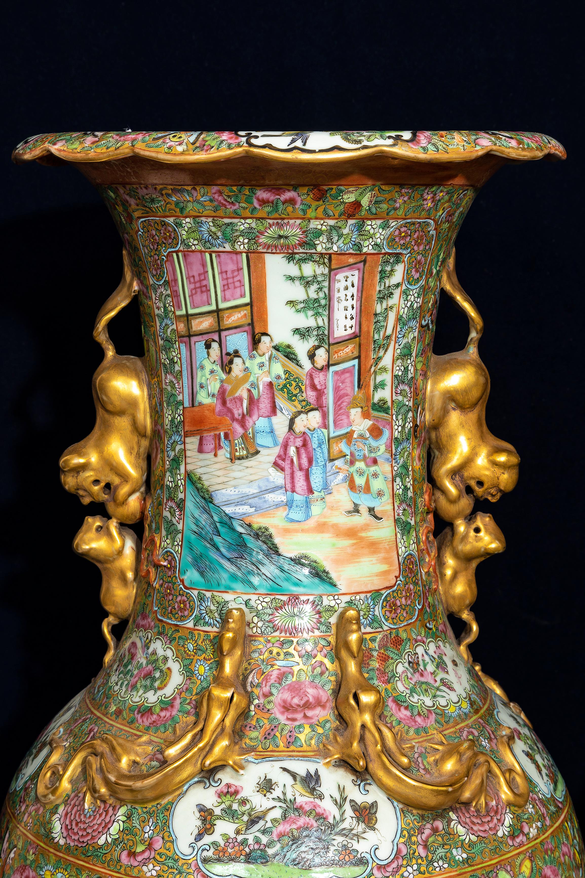 Late 19th Century A Large Pair of Chinese Famille Rose Decorated Gilt Foo Dog Handle Vases For Sale
