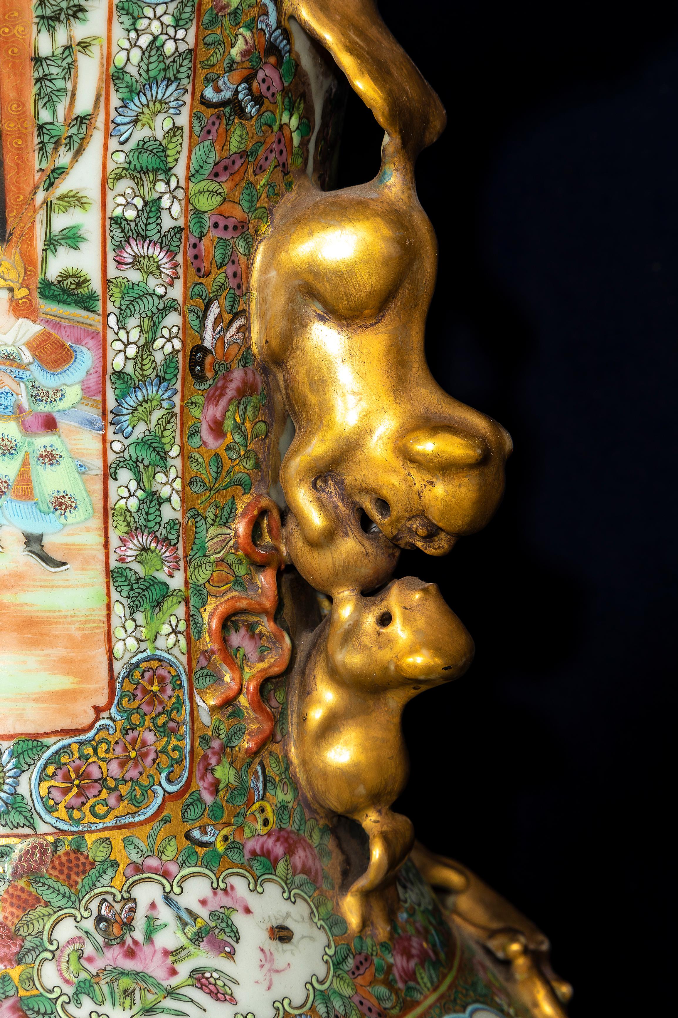 Porcelain A Large Pair of Chinese Famille Rose Decorated Gilt Foo Dog Handle Vases For Sale