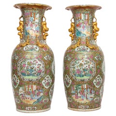 A Large Pair of Chinese Famille Rose Decorated Gilt Foo Dog Handle Vases