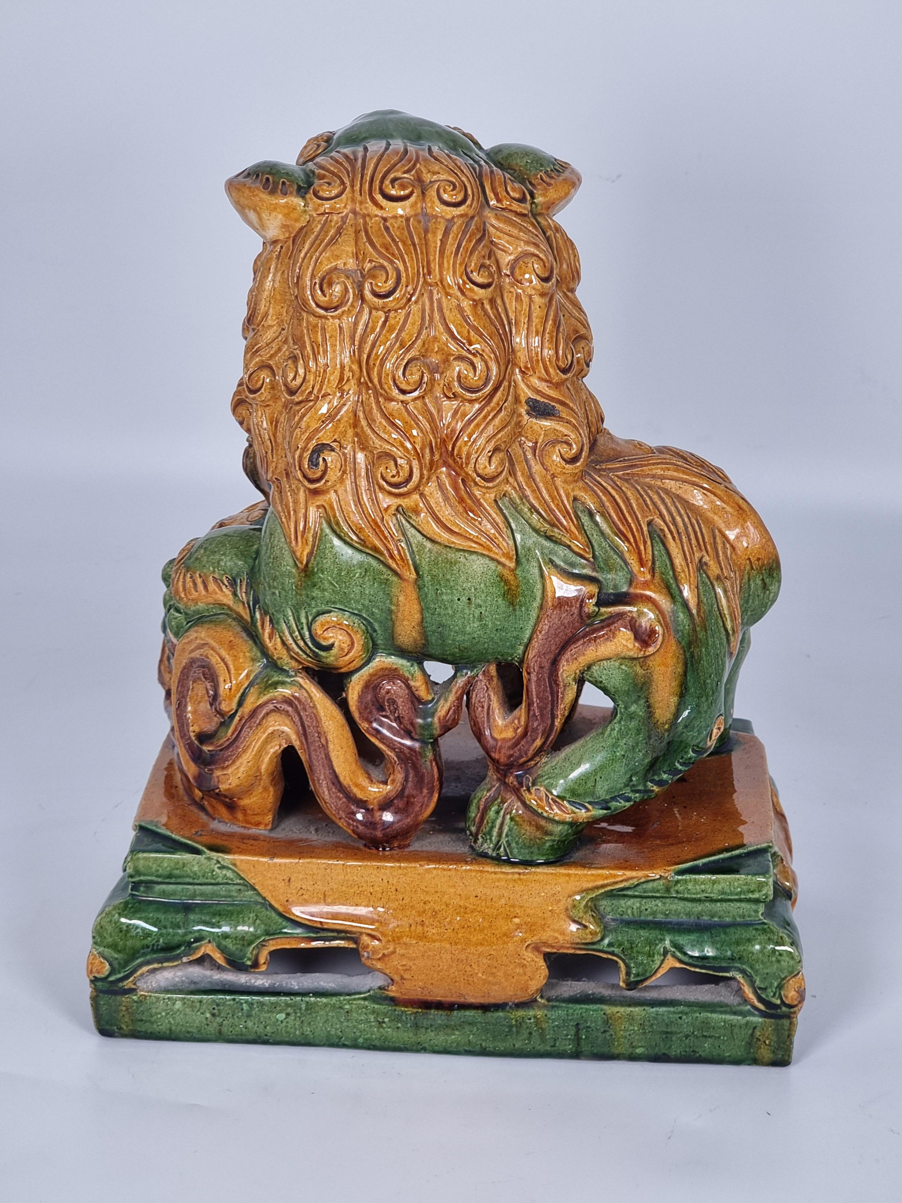 A large pair of Chinese pottery Foo Dogs, circa 1900 11