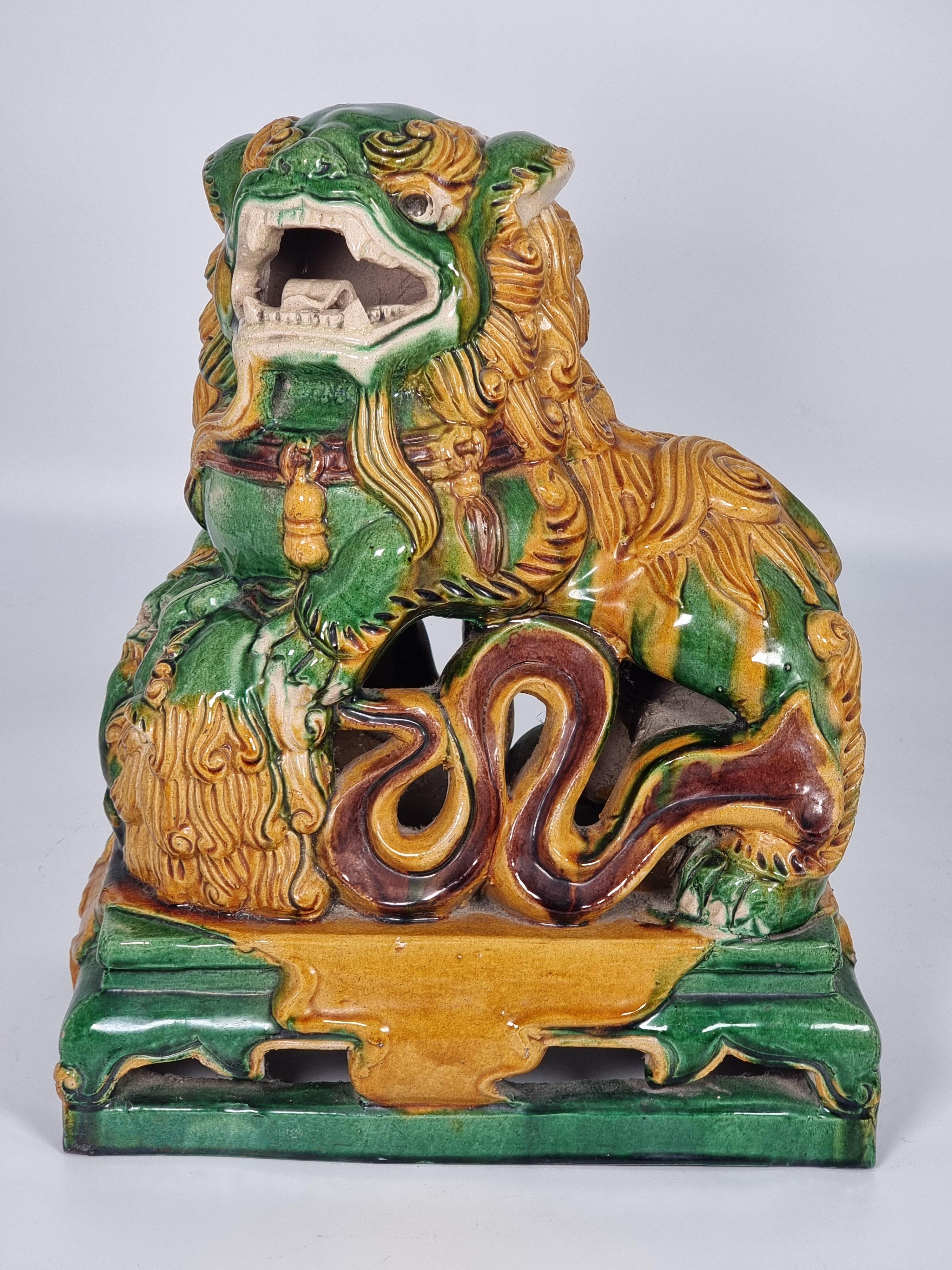 Chinese Export A large pair of Chinese pottery Foo Dogs, circa 1900