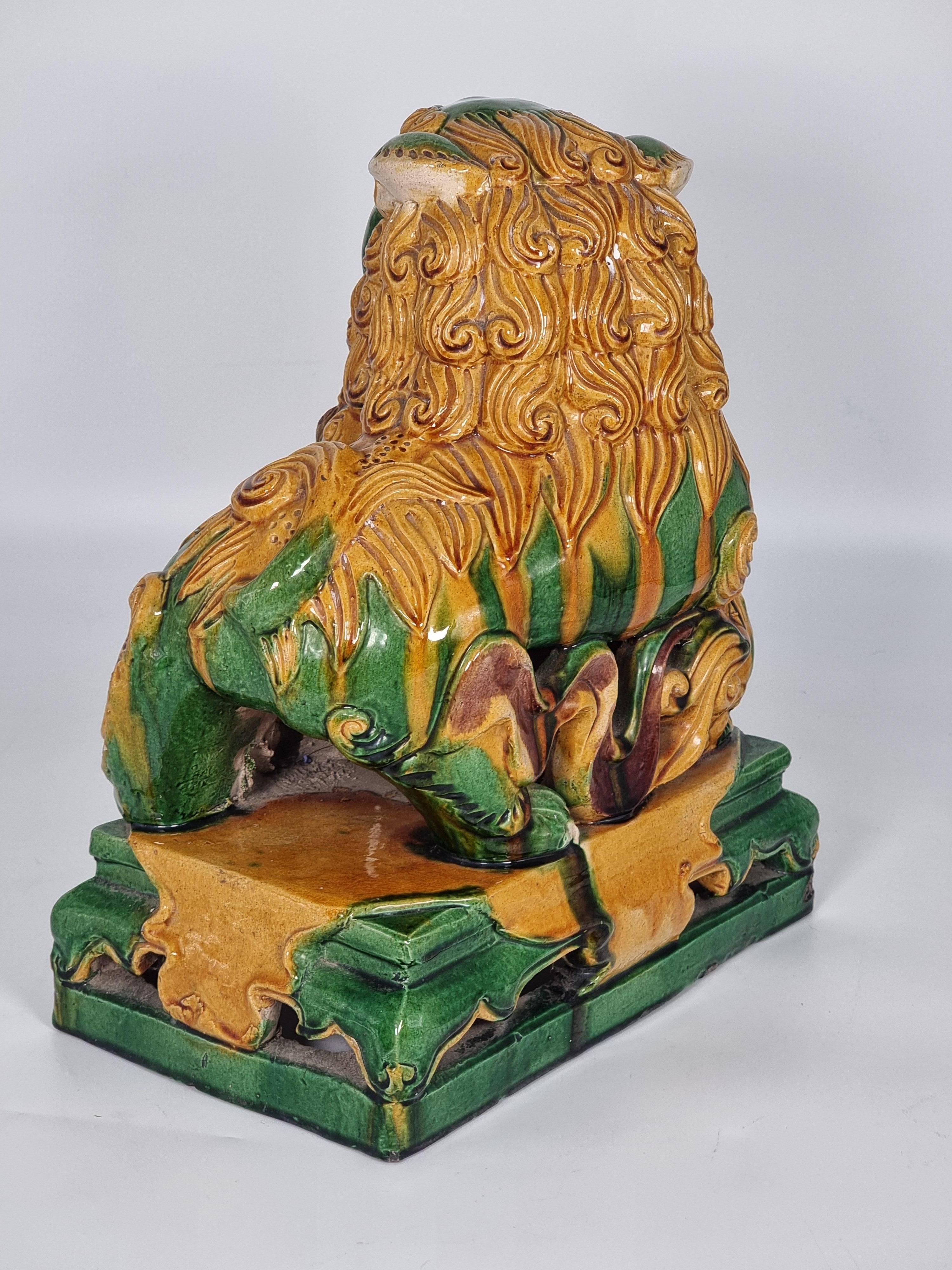 A large pair of Chinese pottery Foo Dogs, circa 1900 1