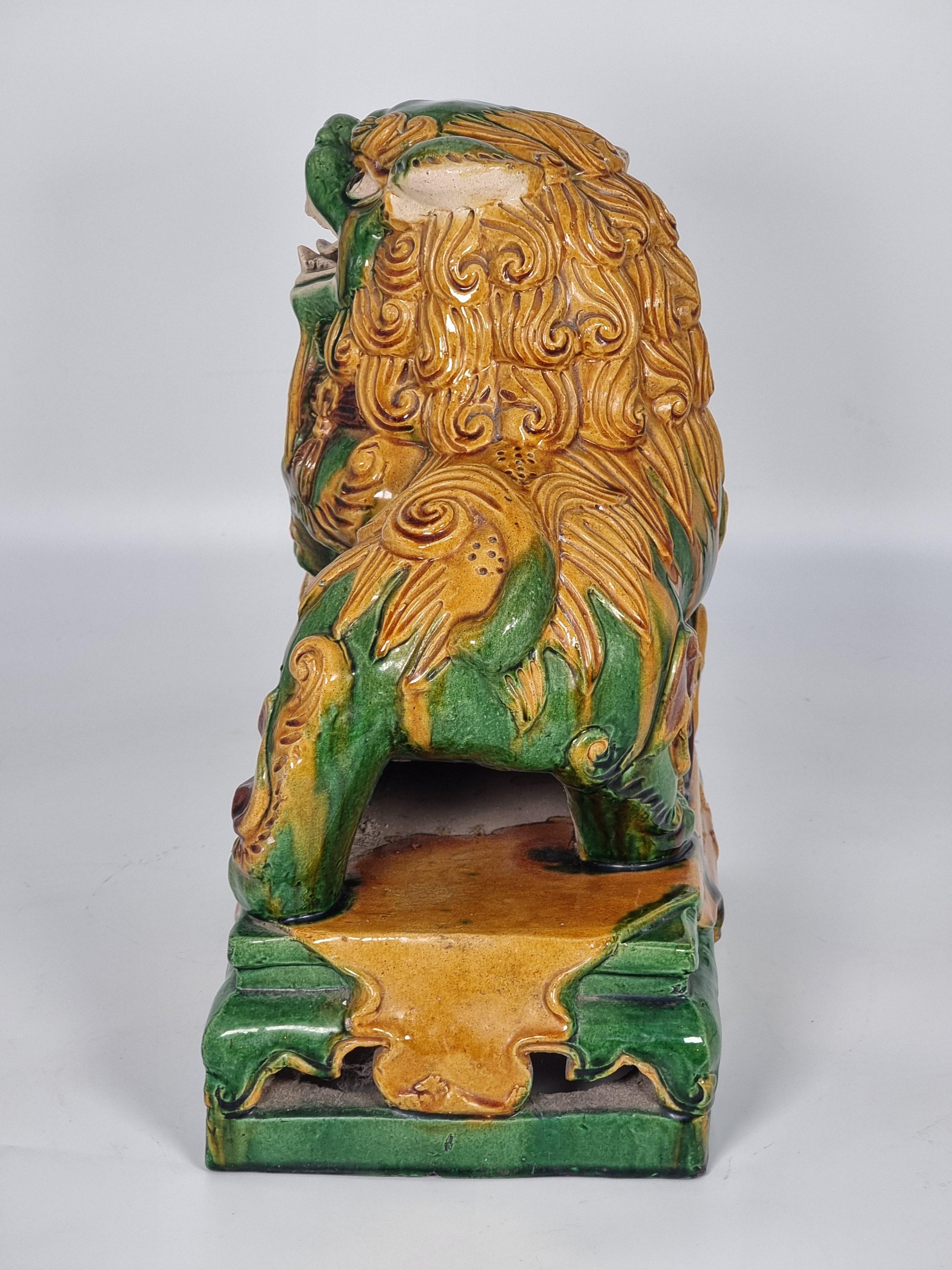 A large pair of Chinese pottery Foo Dogs, circa 1900 2