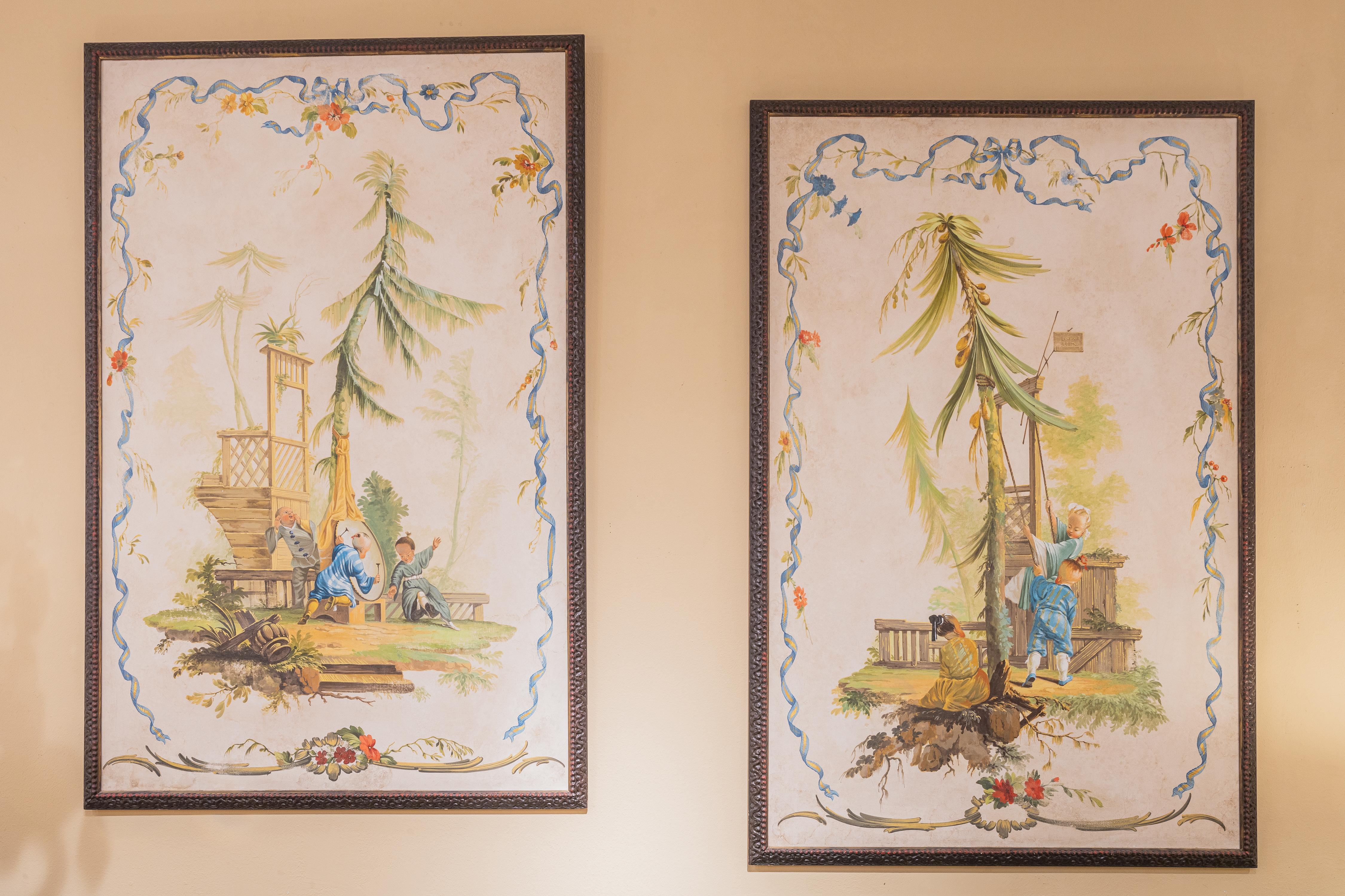 A fine and large pair of late 19th century to early 20th century oil on canvas paintings . Framed with a custom frame. The paintings have scenes of Chinoiserie children at play. Well executed 





