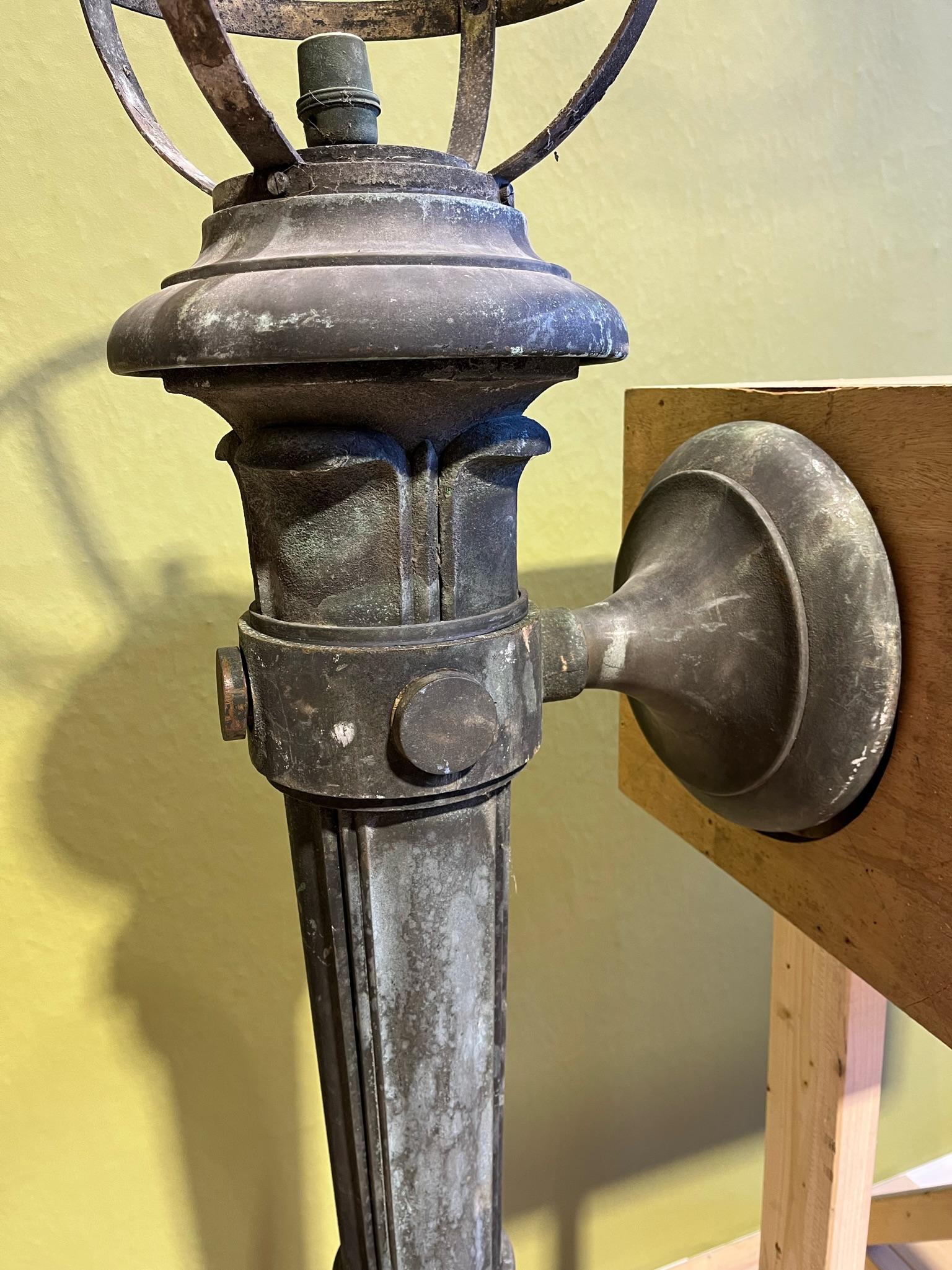 A large pair of 20th century wall lights, wonderful scale and verdigris patina

Needs professional rewire, shades not included

46” high x 18”3/4 deep x 14”3/4 diameter 