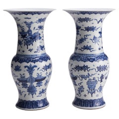 A large pair of flare-topped 19th Century Chinese porcelain vases with blue and