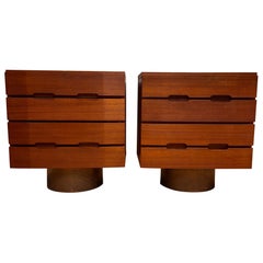 A large pair of four drawers bedside tables A large pair of four drawers bedside tables