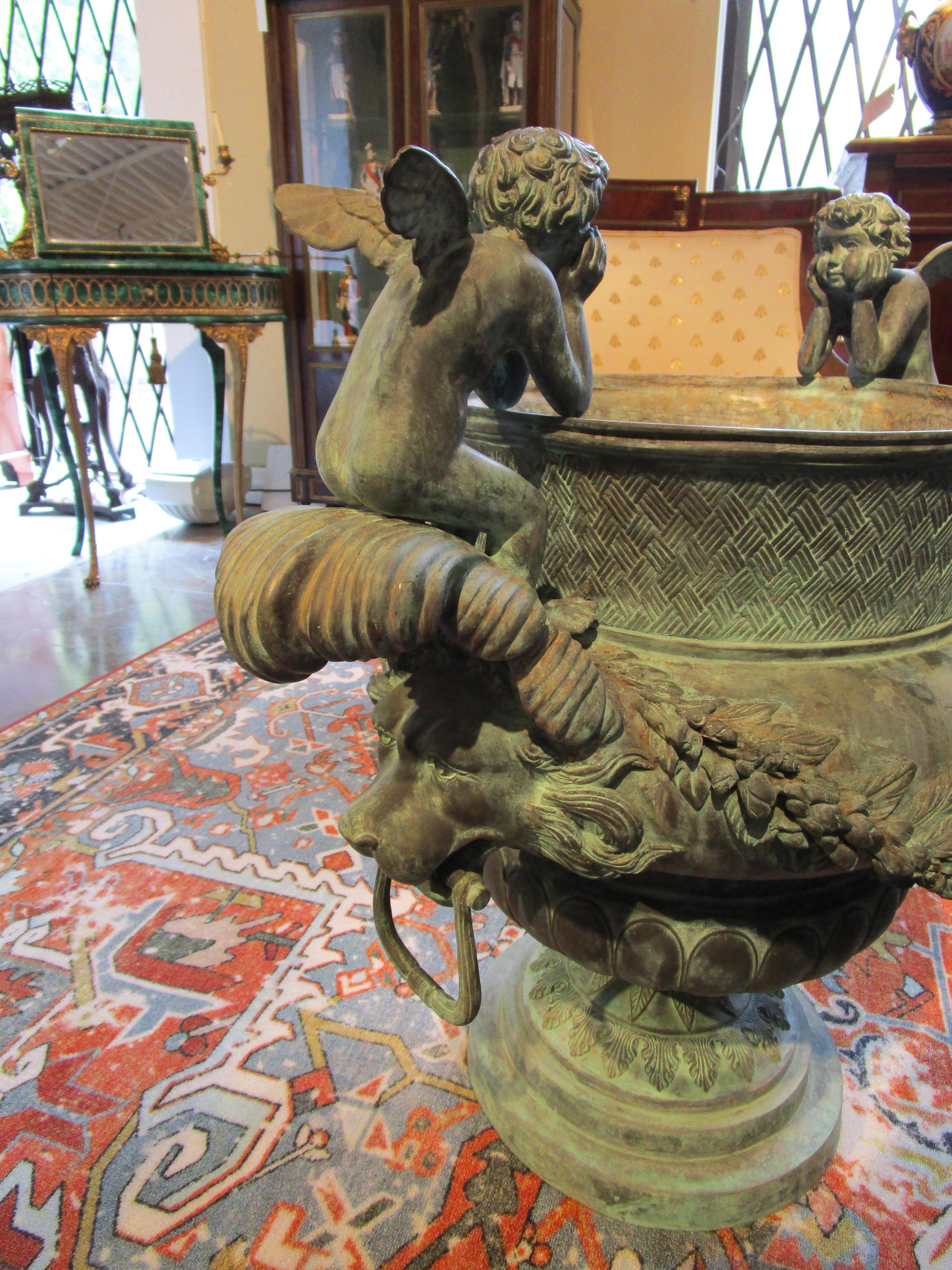 Large Pair of French Bronze Cherub and Lions Head Garden Urns In Good Condition In Dallas, TX