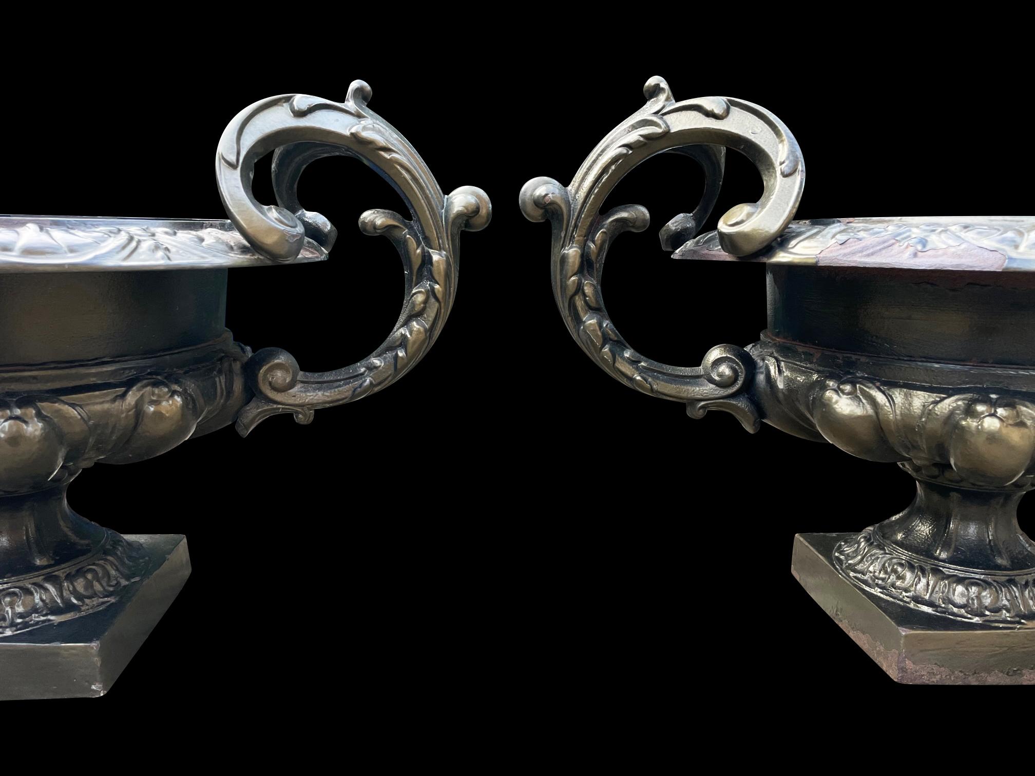 19th Century A Large pair of French Urns with beautifully scrolled handles For Sale