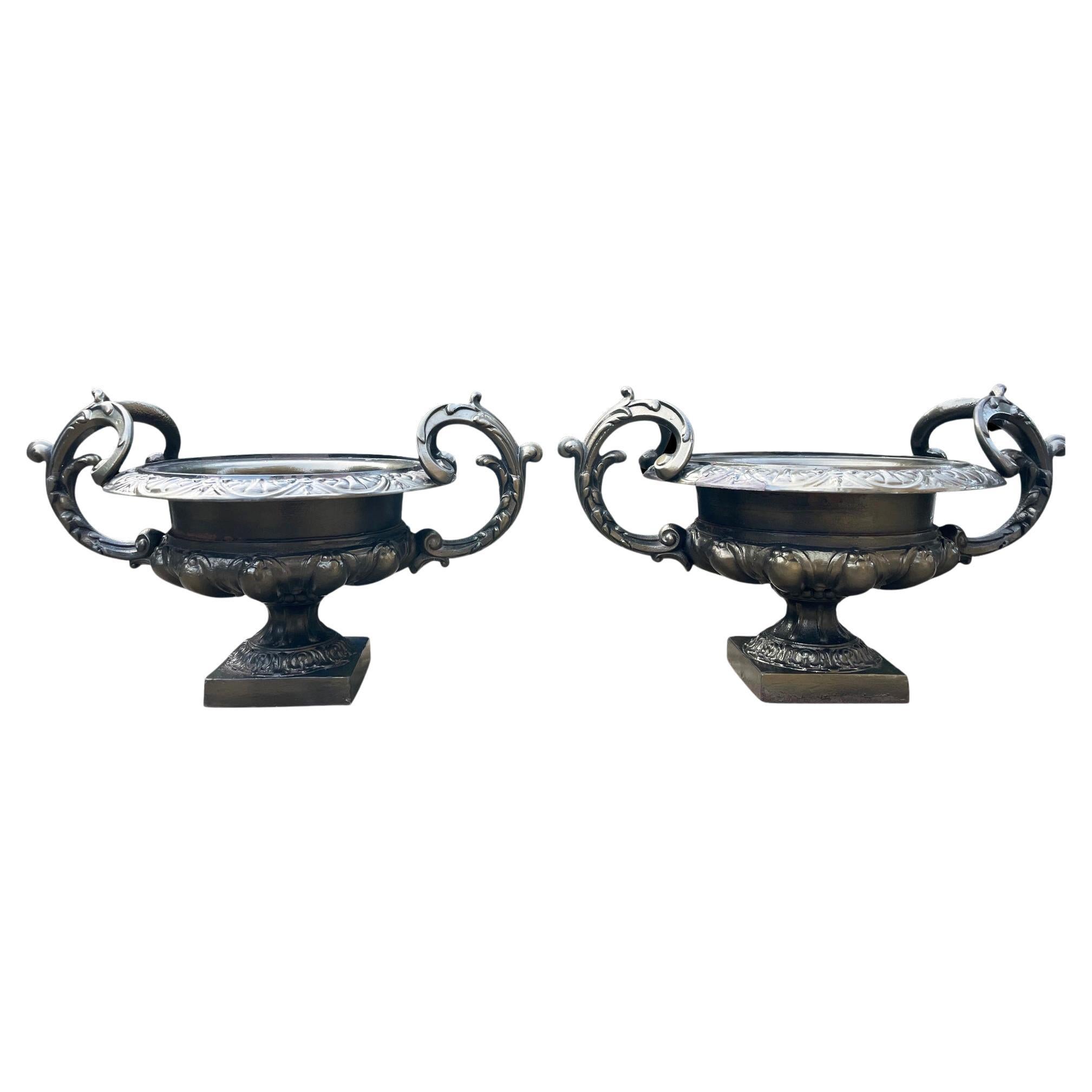 A Large pair of French Urns with beautifully scrolled handles For Sale