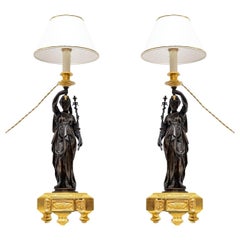 A Large Pair of Gilt and Patinated Bronze Table Lamps, Napoleon III Period.