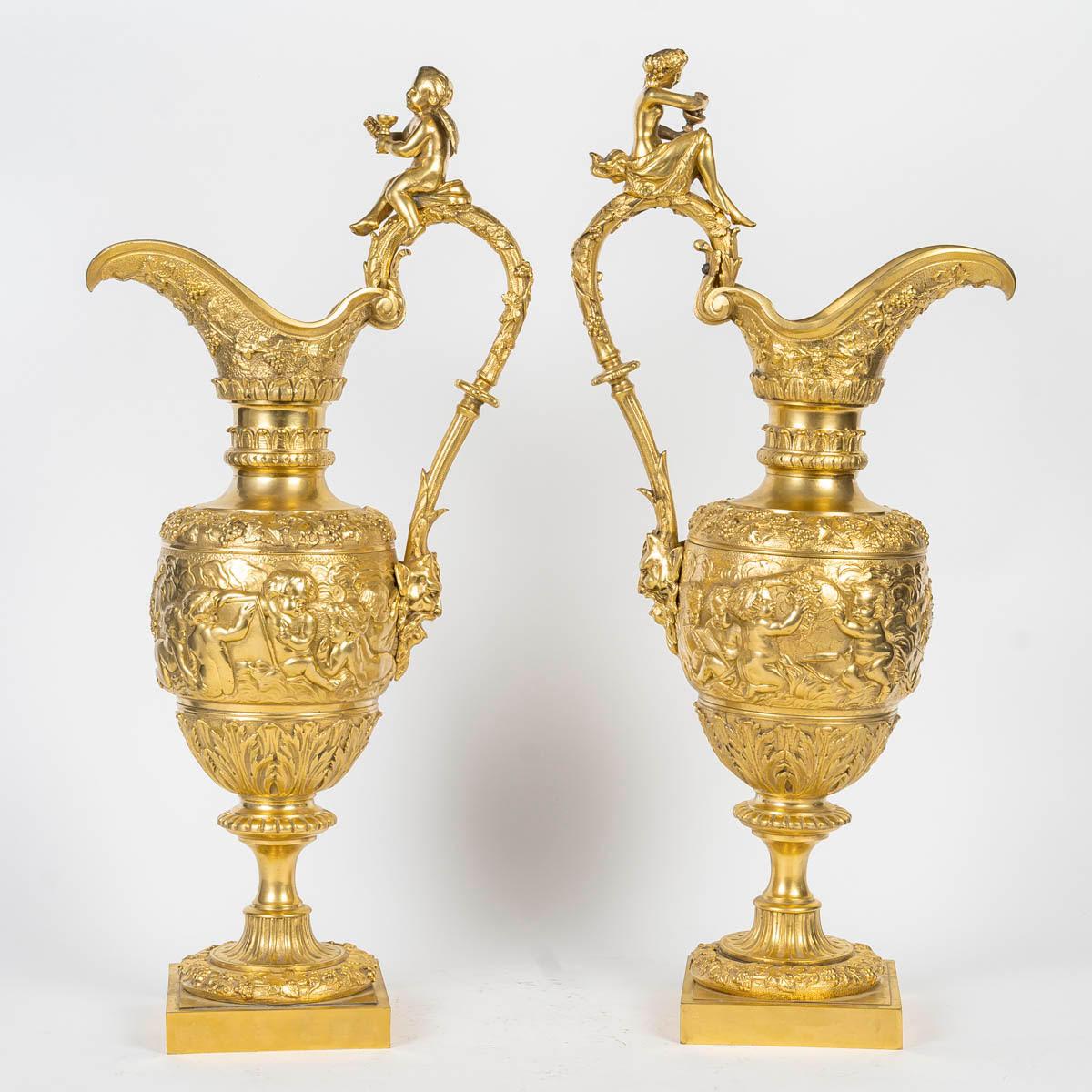French A Large Pair of Gilt Bronze Ewers in the Louis XIV Style, 19th Century. For Sale