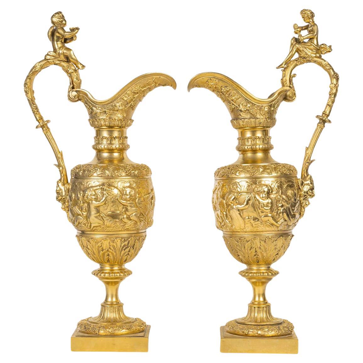 A Large Pair of Gilt Bronze Ewers in the Louis XIV Style, 19th Century. For Sale