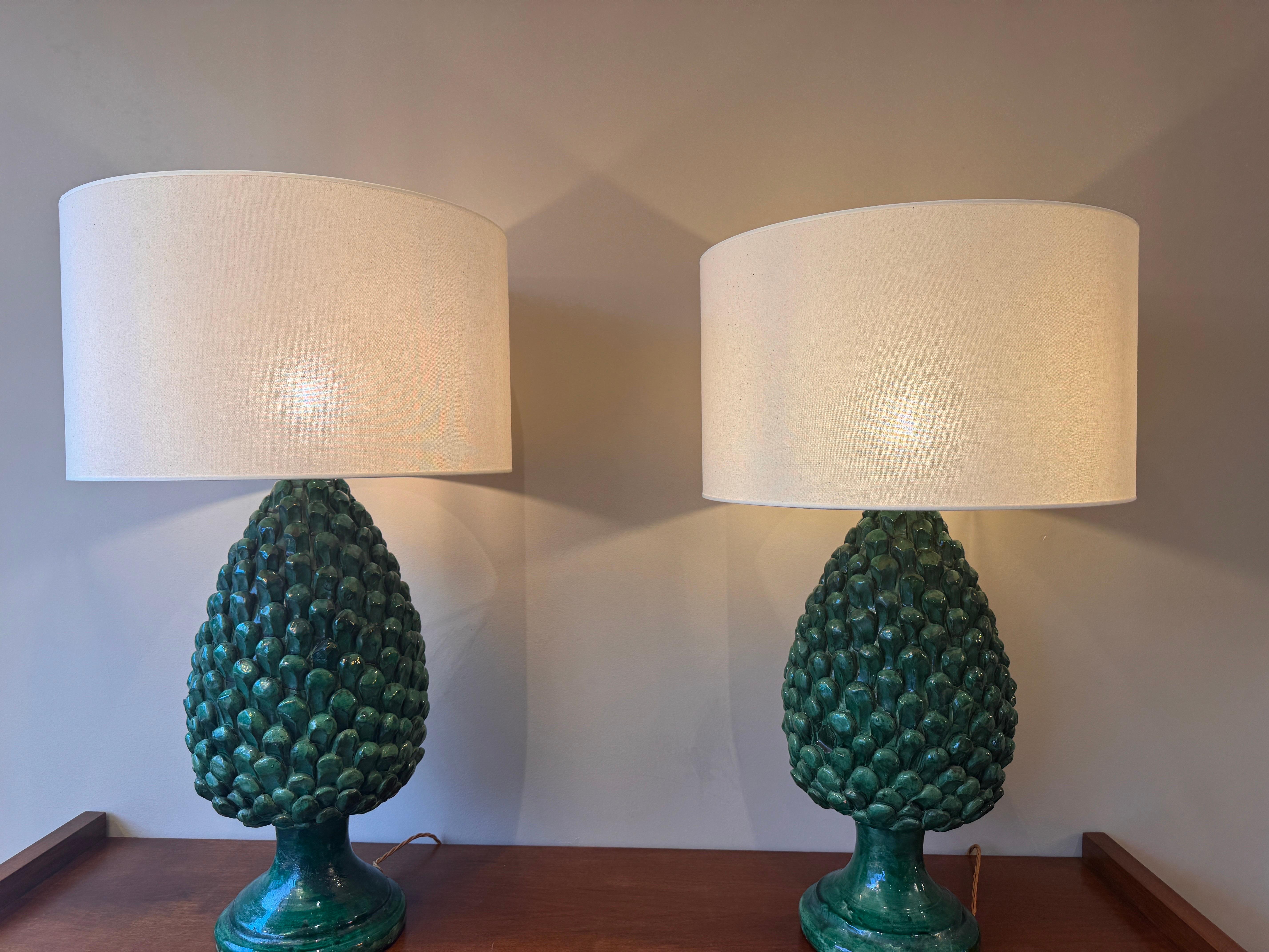 A huge pair of Italian glazed ceramic table lamps in the shape of pine cones measuring 65cm (25.5inches) tall by 35cm (14inches) wide (without shades) 
An optional 50x33cm  lined linen lampshades also available . 