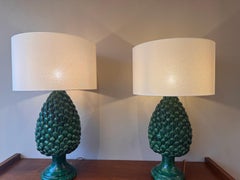 A large pair of glazed ceramic pine cones table lamps