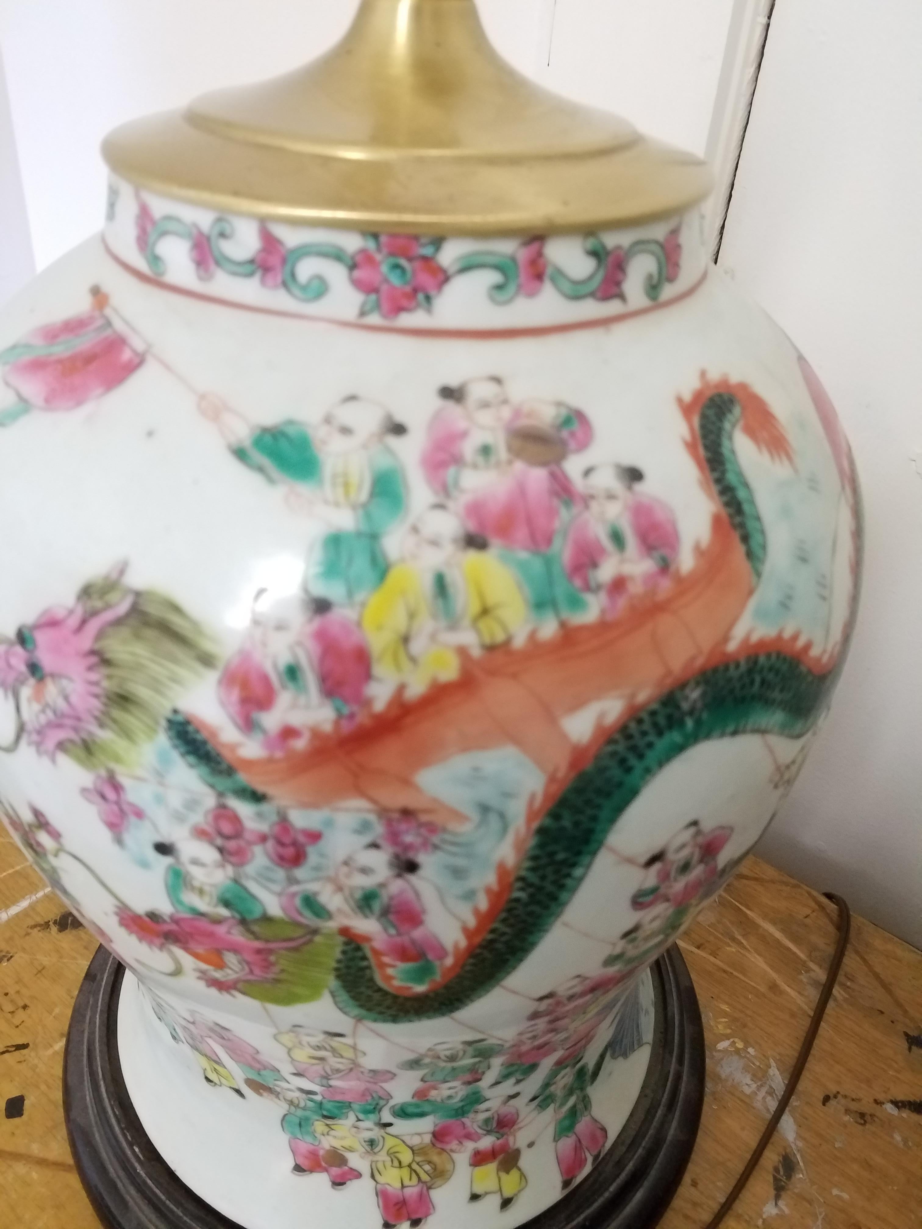 1920s large hand painted Chinese porcelain temple jars mounted as table lamps

Beautiful pair of Chinese Jars hand painted with amazing colors and
detail with many figures, a dragon and floral decoration. Statement pieces that will enhance any