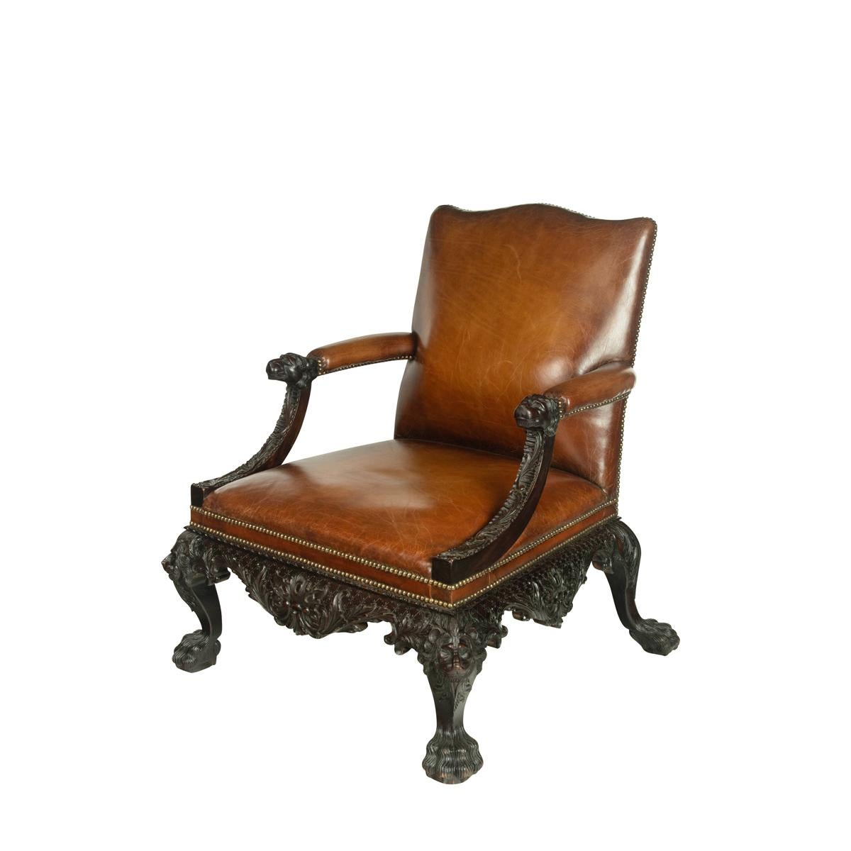 English A large pair of Irish mahogany library armchairs in the Georgian style For Sale