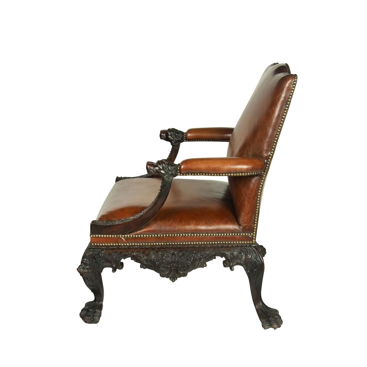 A large pair of Irish mahogany library armchairs in the Georgian style In Good Condition For Sale In Lymington, Hampshire