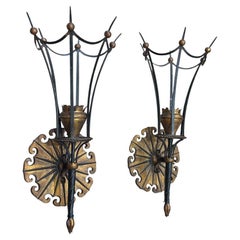 A large pair of Italian 1940s torchiere gilt and black metal wall sconces