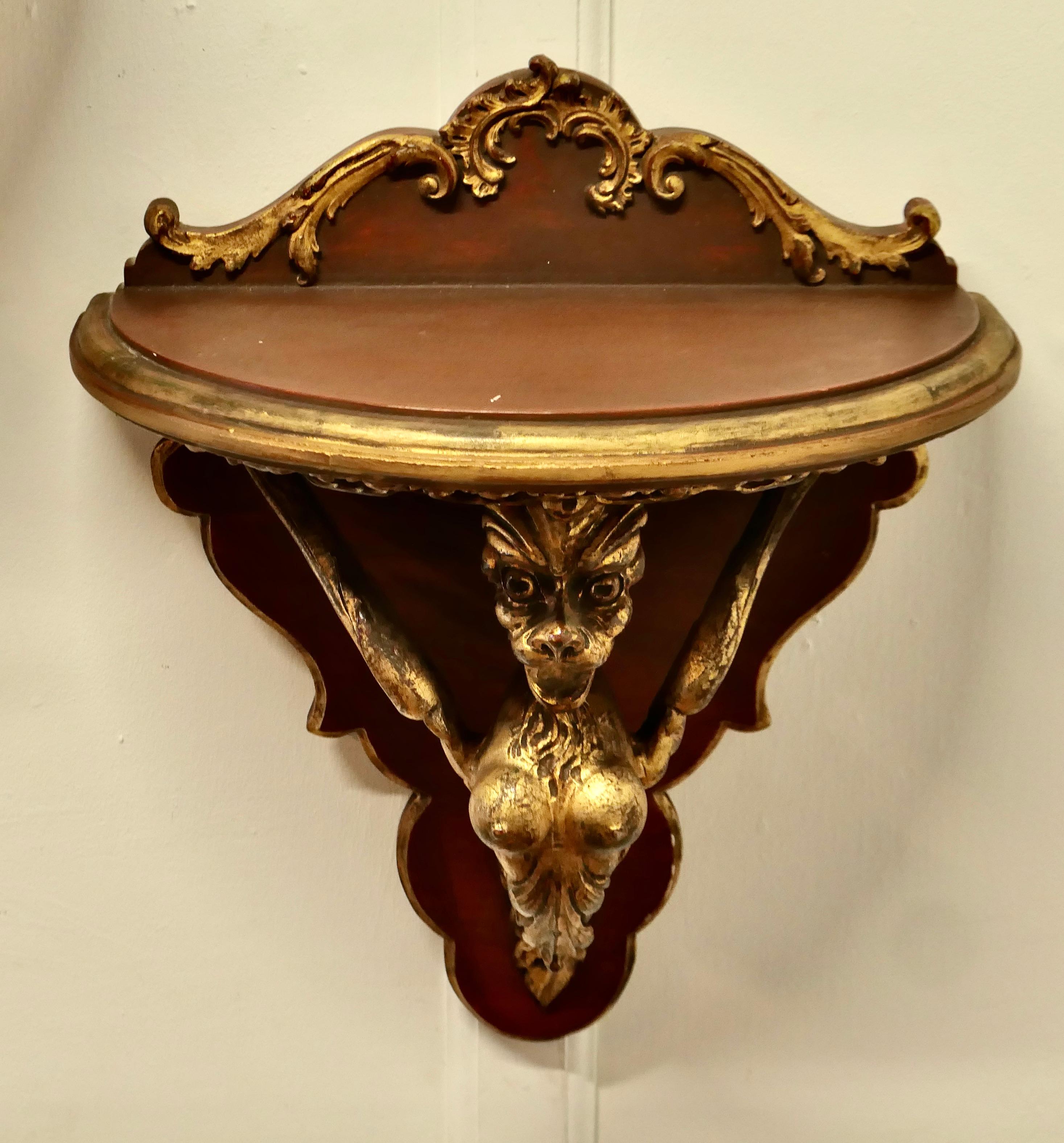 Chestnut A Large Pair of Italian Carved Gilt Wall Brackets  These are beautifully carved For Sale