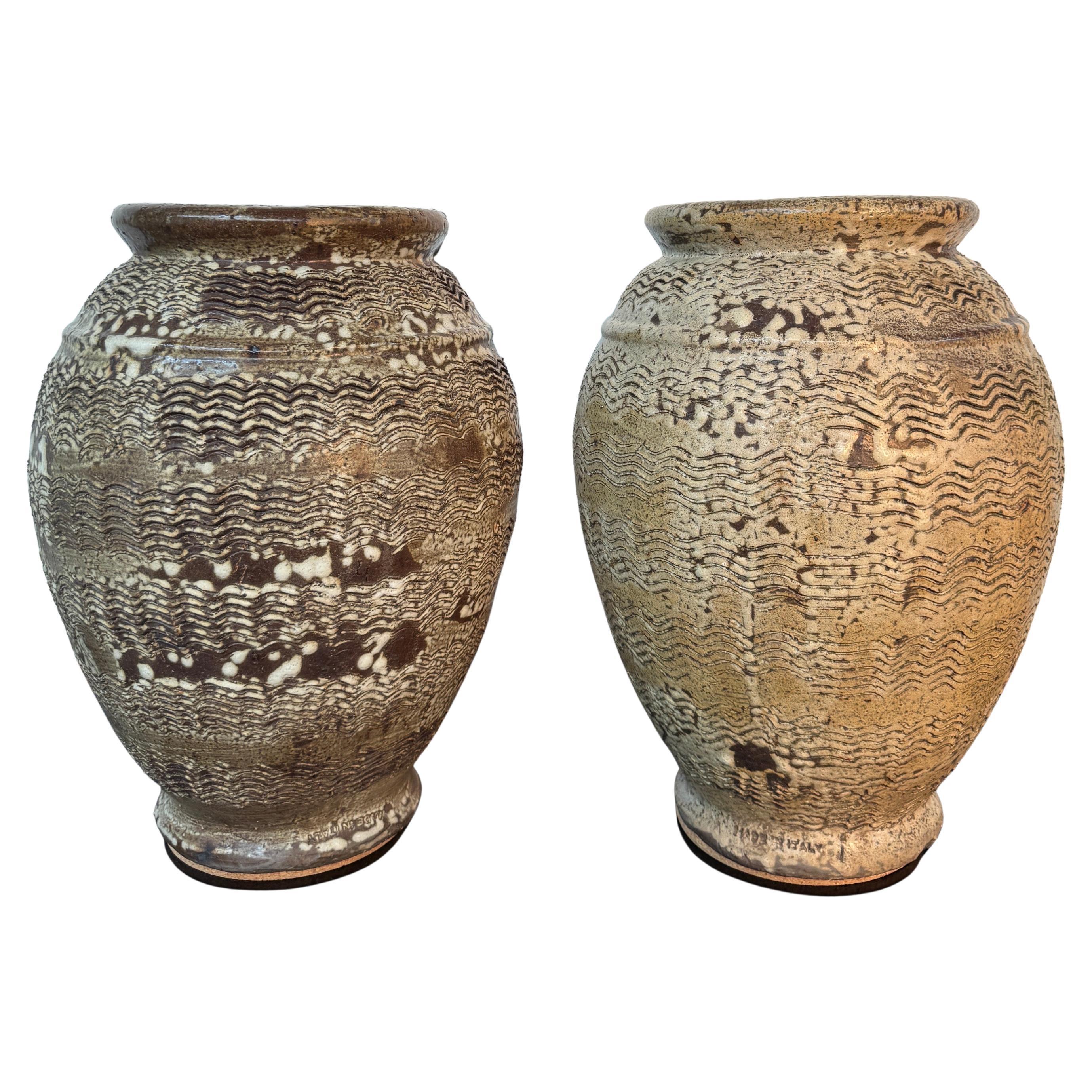 A large pair of Italian rustic stoneware jars