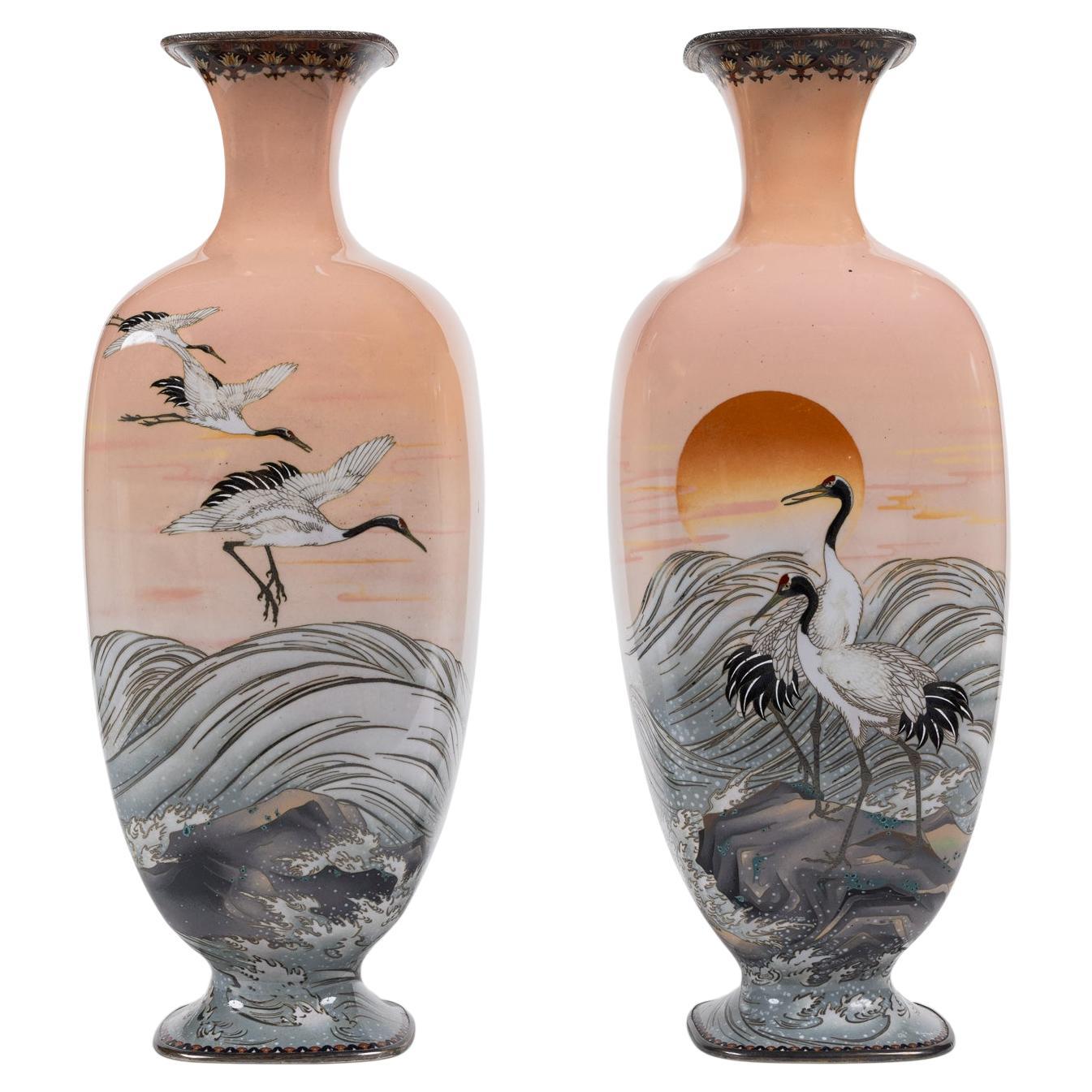 A Large Pair of Japanese Cloisonne Pink-Ground Vases Featuring Sunset and Cranes For Sale